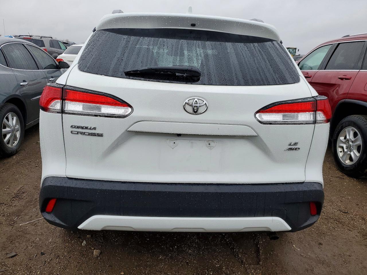2023 Toyota Corolla Cross Le White vin: 7MUBAABG6PV047696