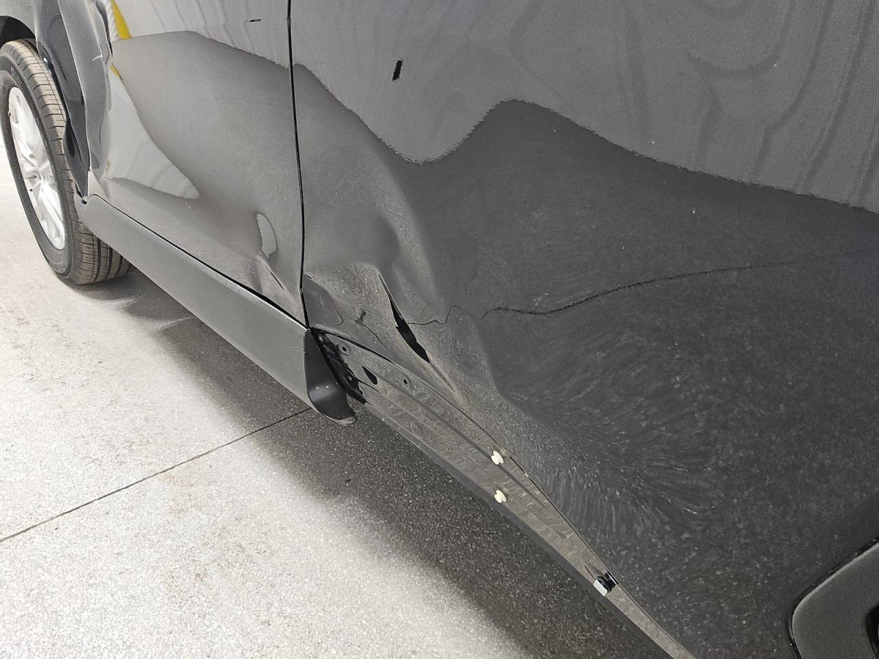 2025 Toyota Corolla Cross Le Black vin: 7MUCAAAG0SV143385 Damage: Left Rear Door, Dent(S) W/ Paint Dmg, > 12 Inches