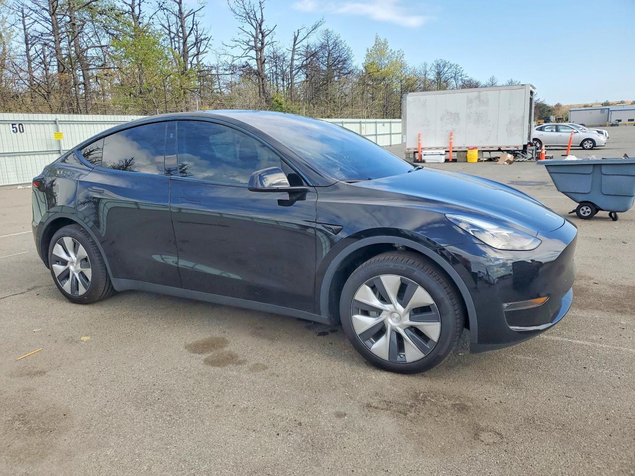 2024 Tesla Model Y Black vin: 7SAYGAEE4RF009102