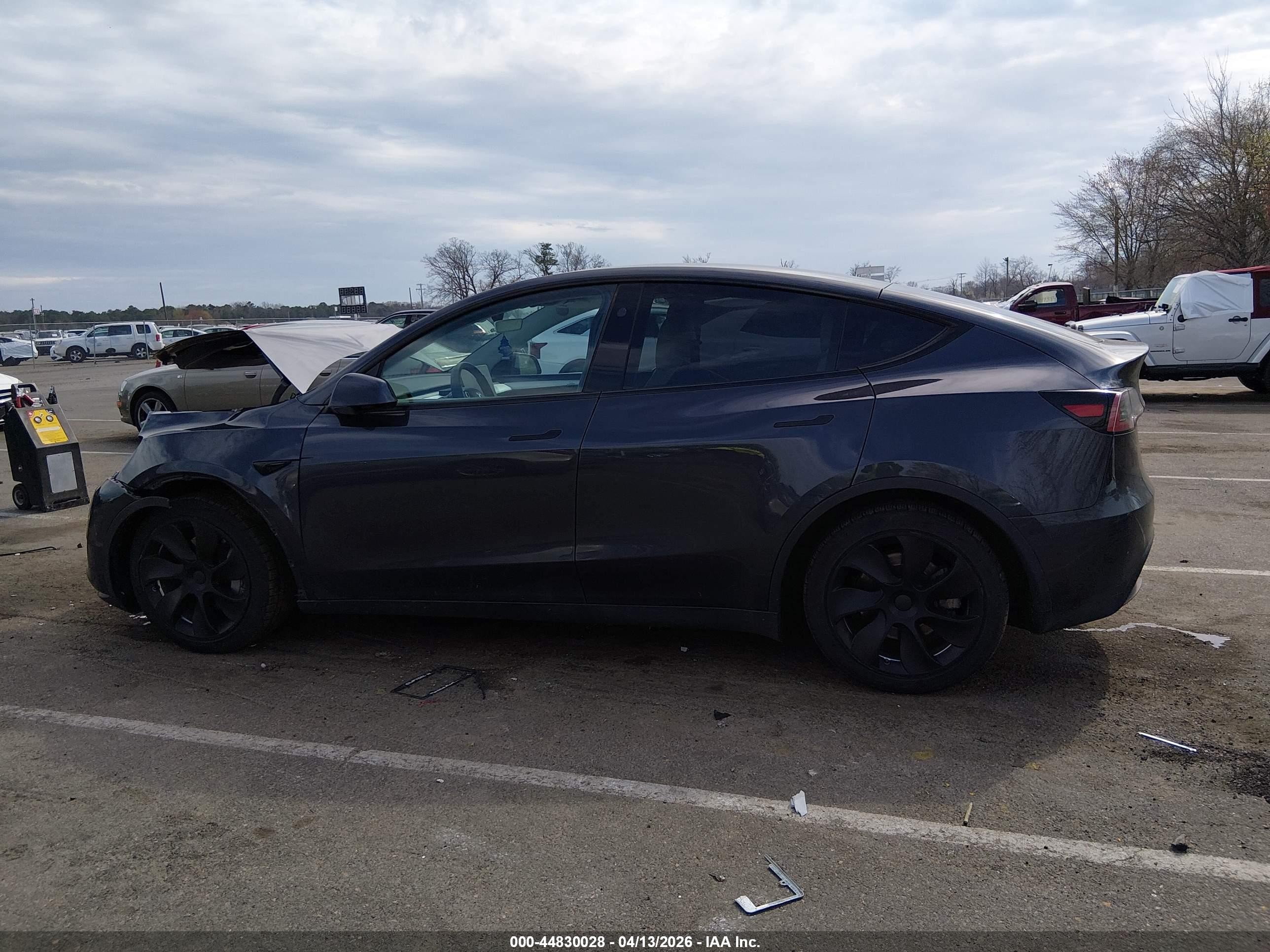 2024 Tesla Model Y Long Range Dual Motor All-wheel Drive Gray vin: 7SAYGAEE4RF022481