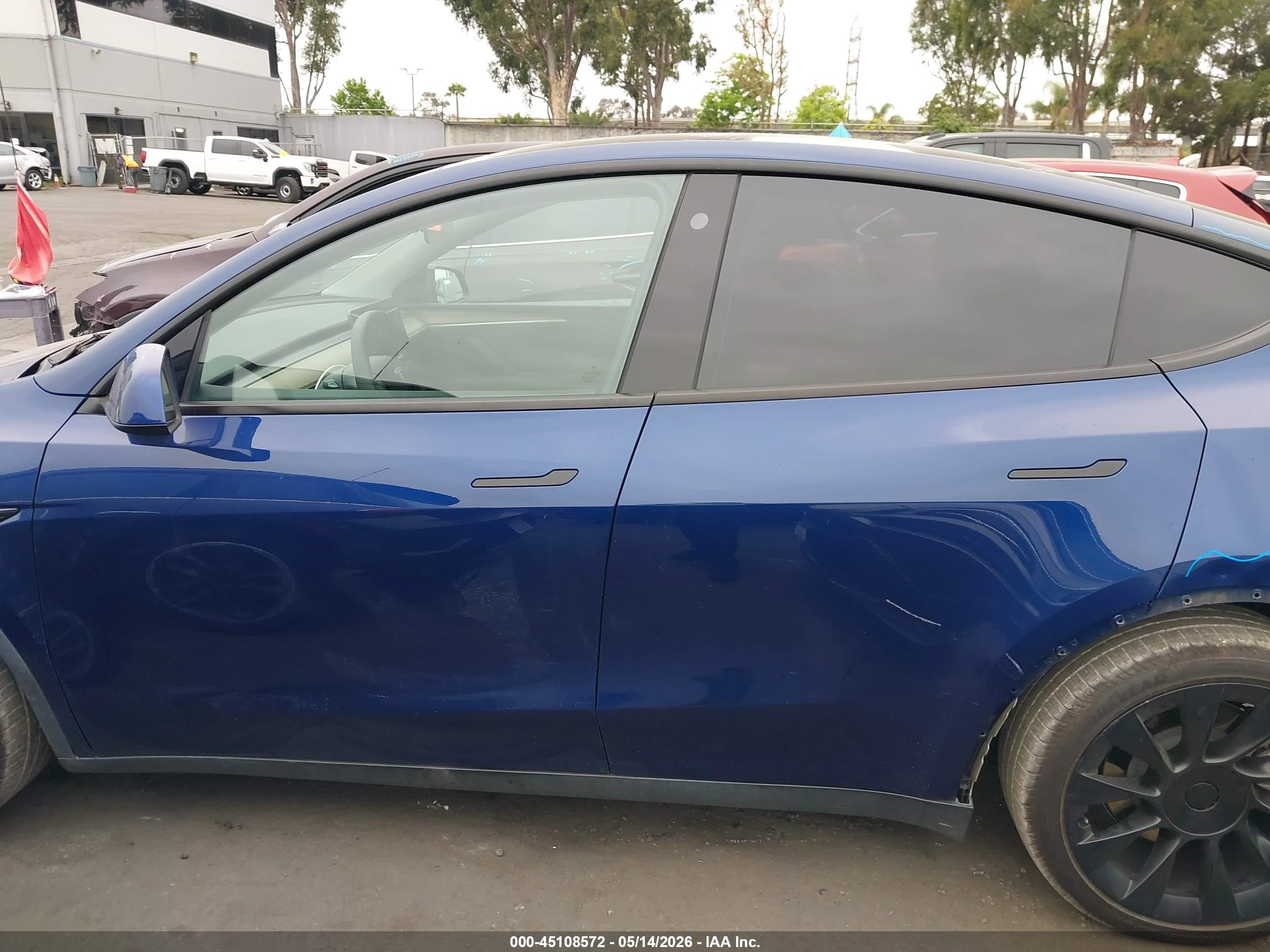 2023 Tesla Model Y Awd/long Range Dual Motor All-wheel Drive Blue vin: 7SAYGAEE6PF706588