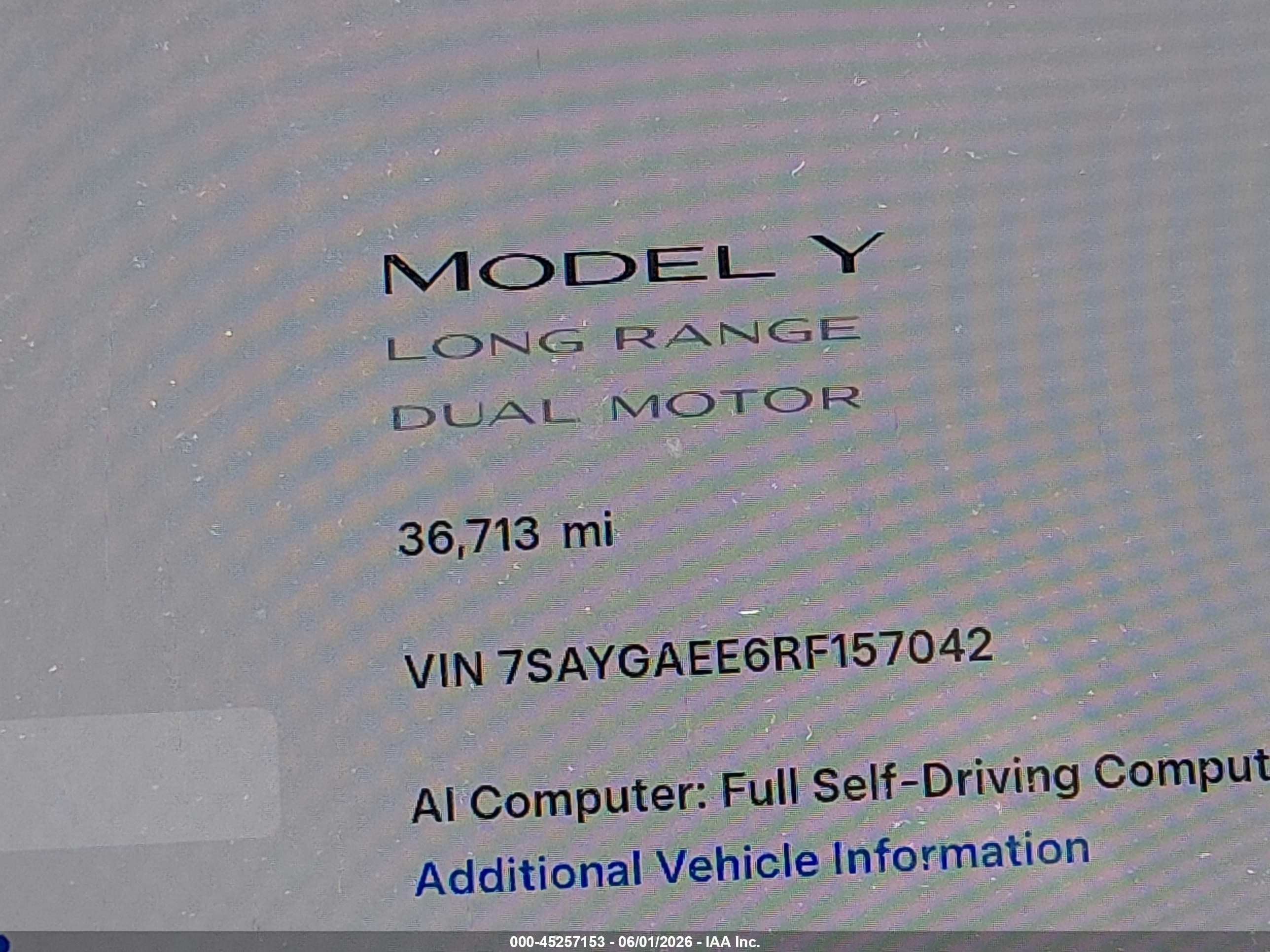 2024 Tesla Model Y Long Range Dual Motor All-wheel Drive White vin: 7SAYGAEE6RF157042