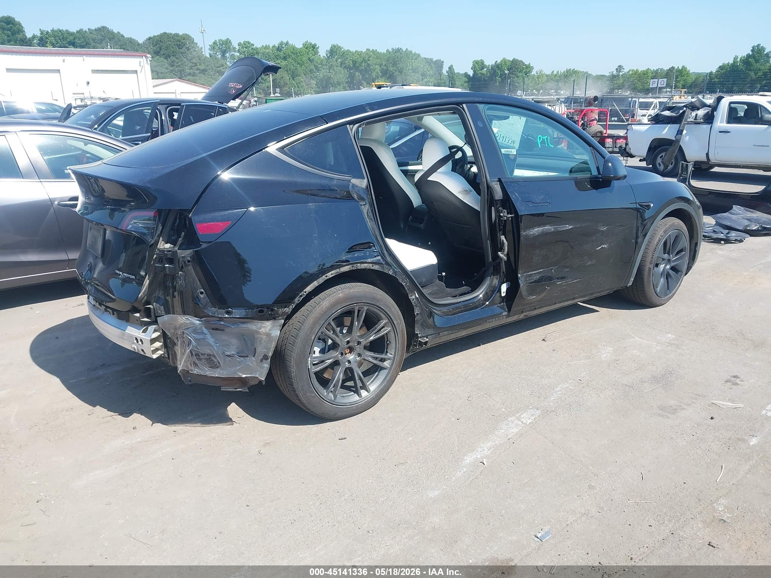 2024 Tesla Model Y Long Range Dual Motor All-wheel Drive Black vin: 7SAYGAEE8RF150268