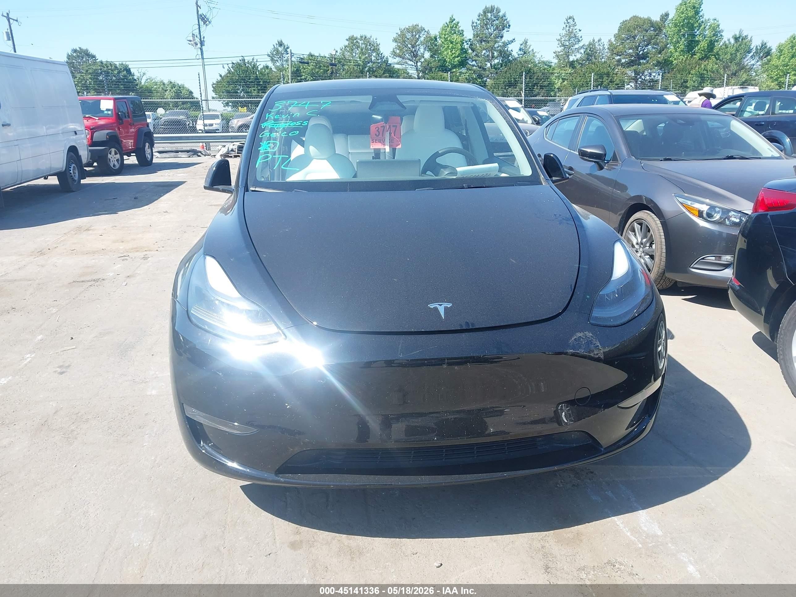 2024 Tesla Model Y Long Range Dual Motor All-wheel Drive Black vin: 7SAYGAEE8RF150268