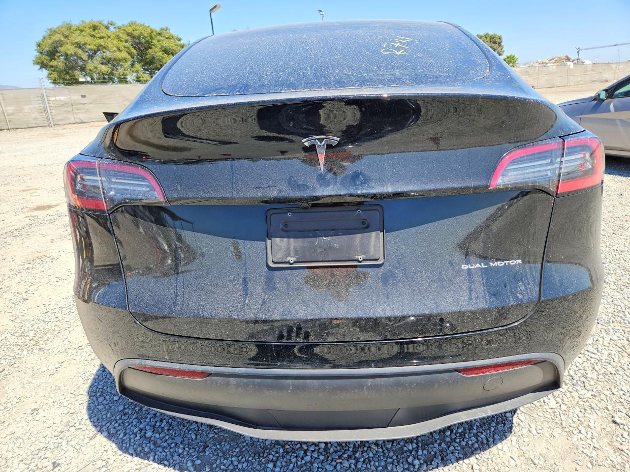 2025 Tesla Model Y Black vin: 7SAYGAEEXSF271552