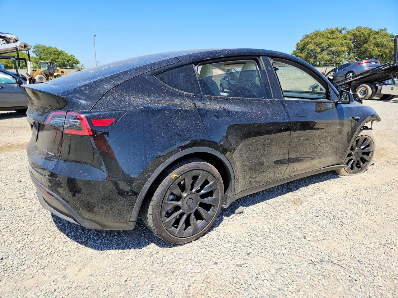 2025 Tesla Model Y Black vin: 7SAYGAEEXSF271552