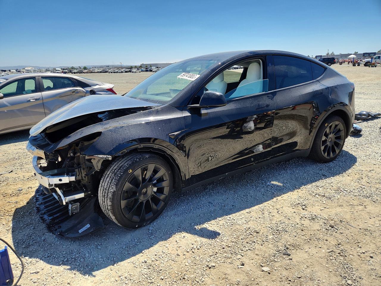 2025 Tesla Model Y Black vin: 7SAYGAEEXSF271552