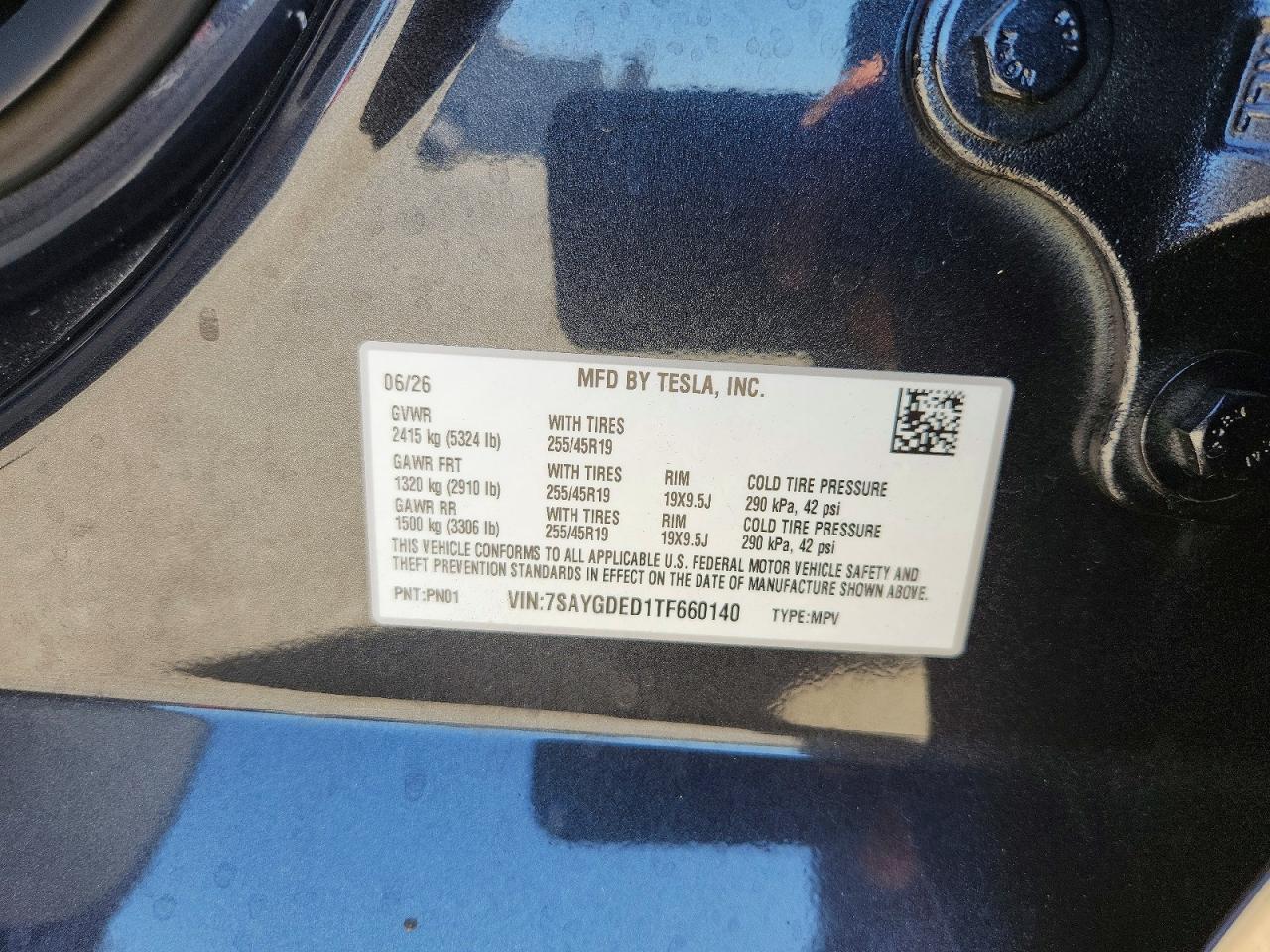 2026 Tesla Model Y Black vin: 7SAYGDED1TF660140