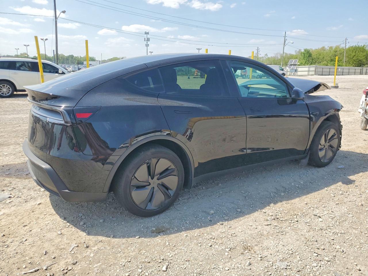 2026 Tesla Model Y Black vin: 7SAYGDED2TF421843