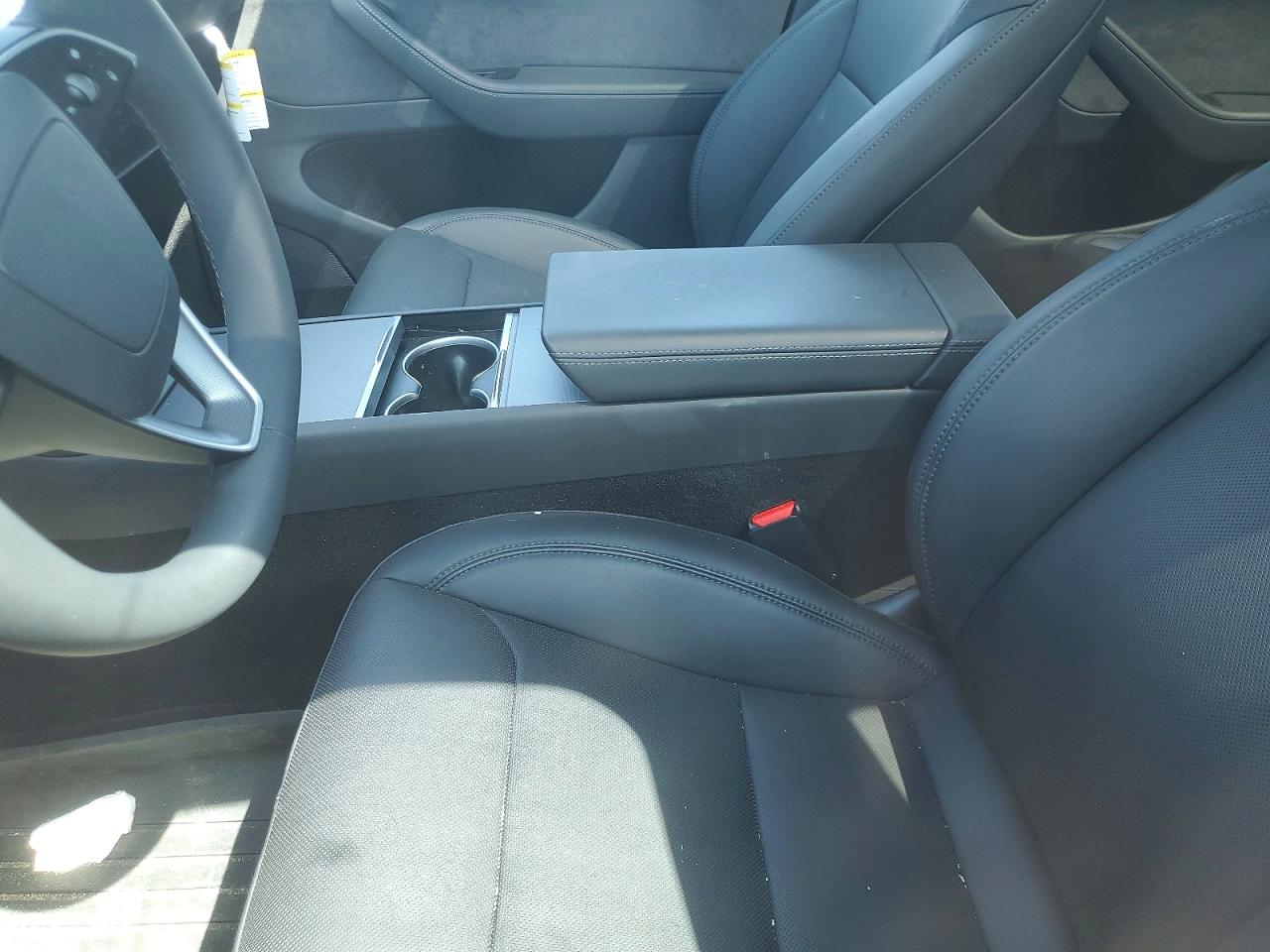 2026 Tesla Model Y Black vin: 7SAYGDED2TF421843