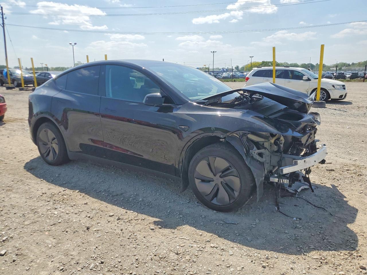 2026 Tesla Model Y Black vin: 7SAYGDED2TF421843