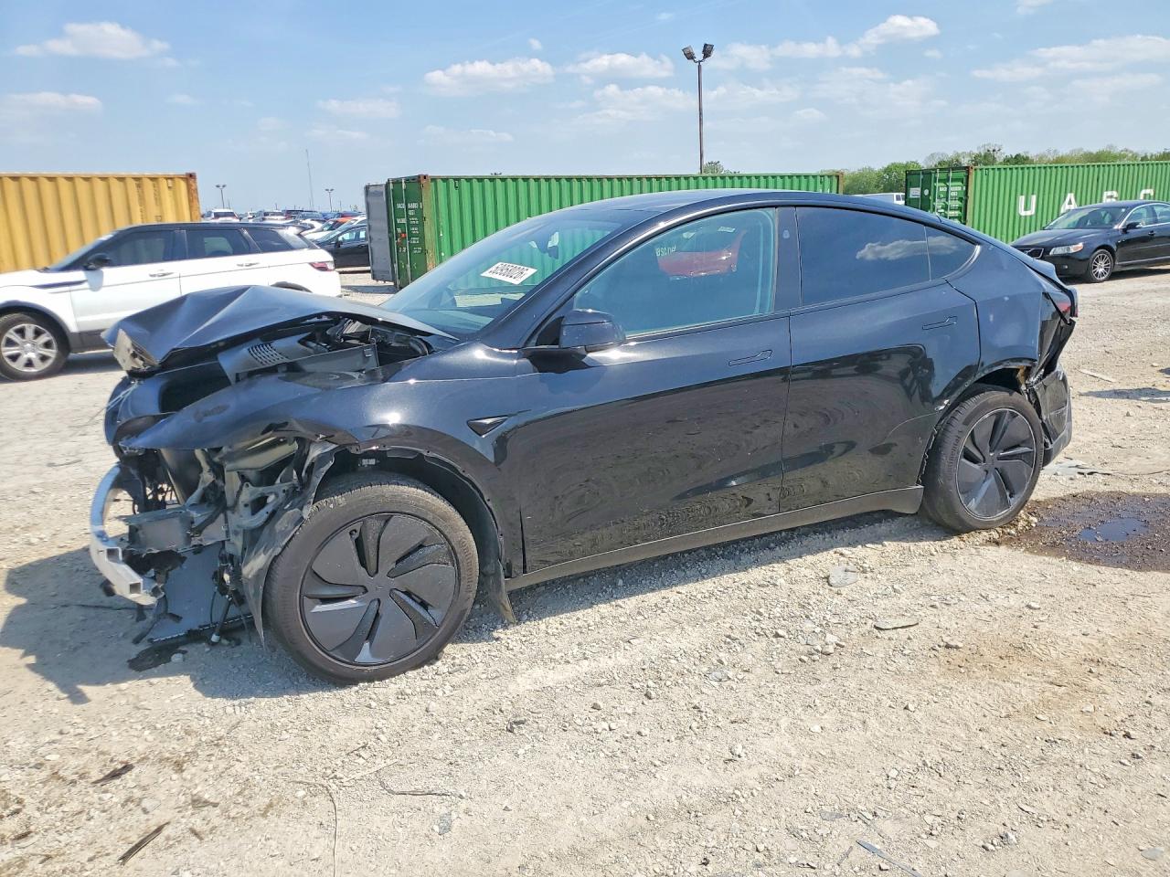2026 Tesla Model Y Black vin: 7SAYGDED2TF421843