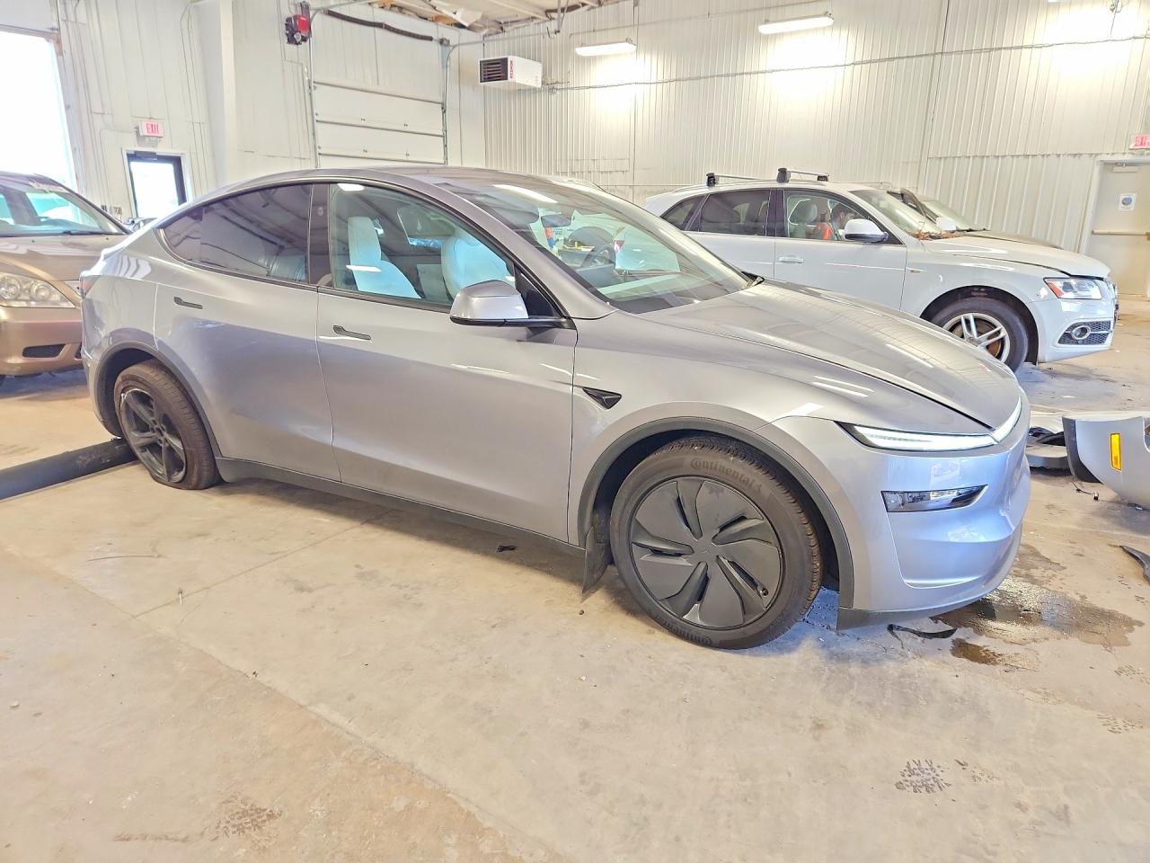 2026 Tesla Model Y Silver vin: 7SAYGDED2TF585996