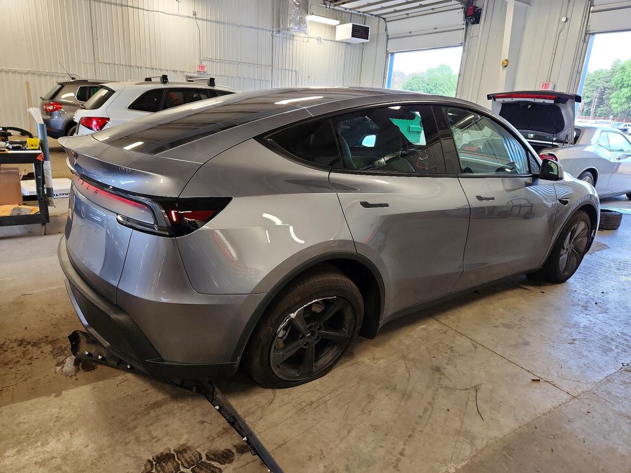 2026 Tesla Model Y Silver vin: 7SAYGDED2TF585996
