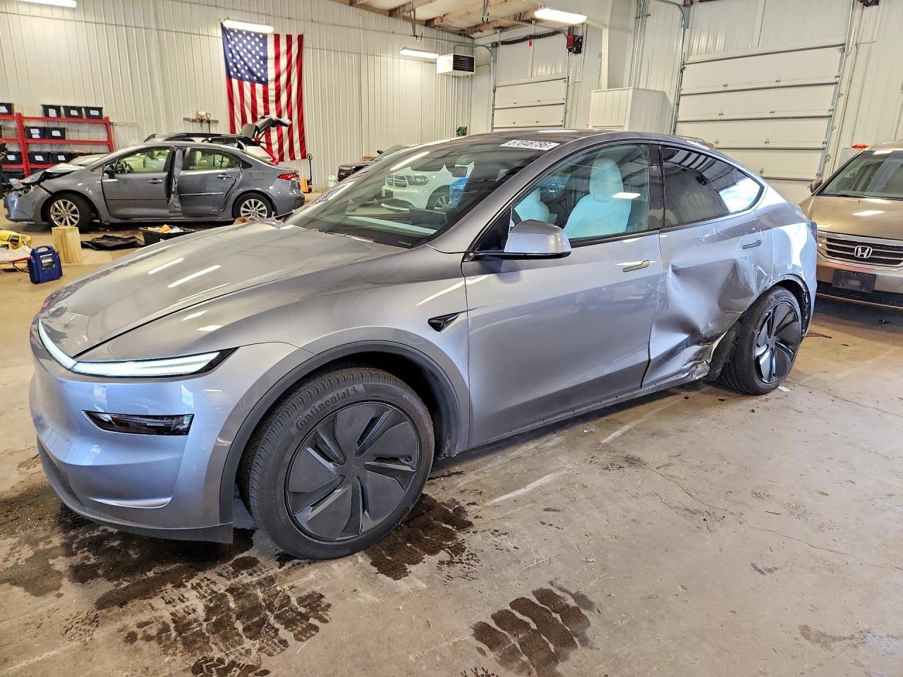 2026 Tesla Model Y Silver vin: 7SAYGDED2TF585996