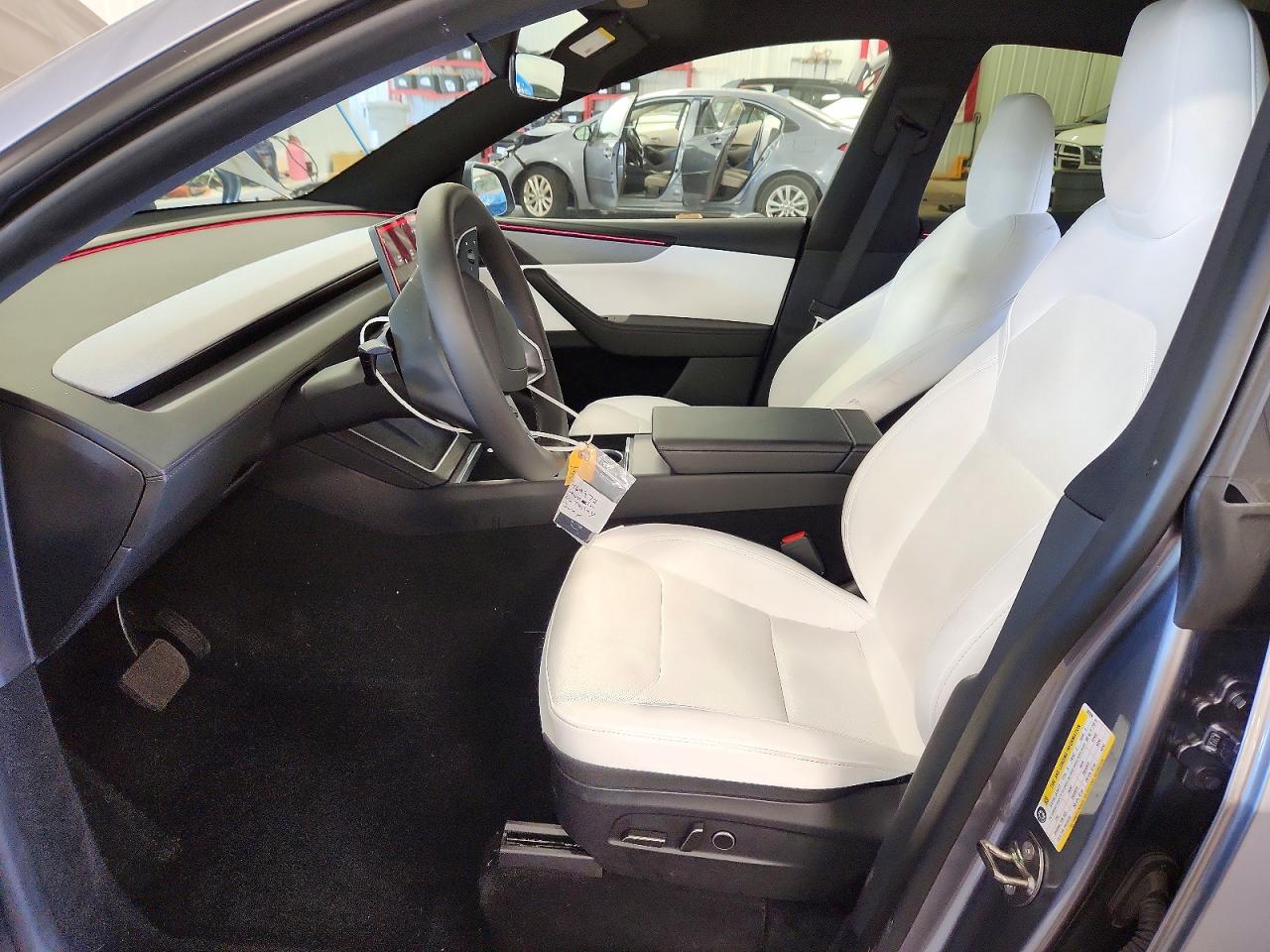 2026 Tesla Model Y Silver vin: 7SAYGDED2TF585996