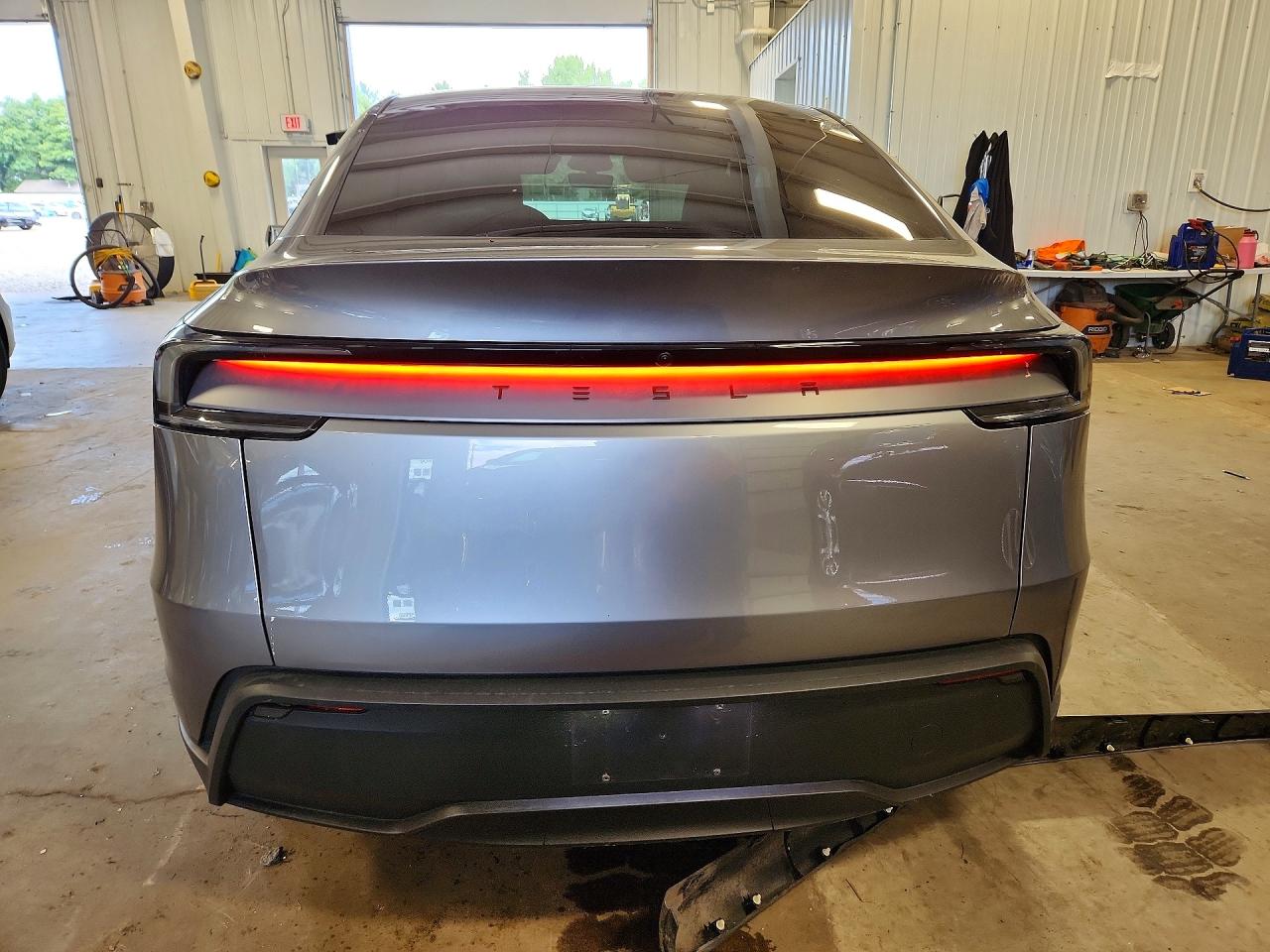 2026 Tesla Model Y Silver vin: 7SAYGDED2TF585996