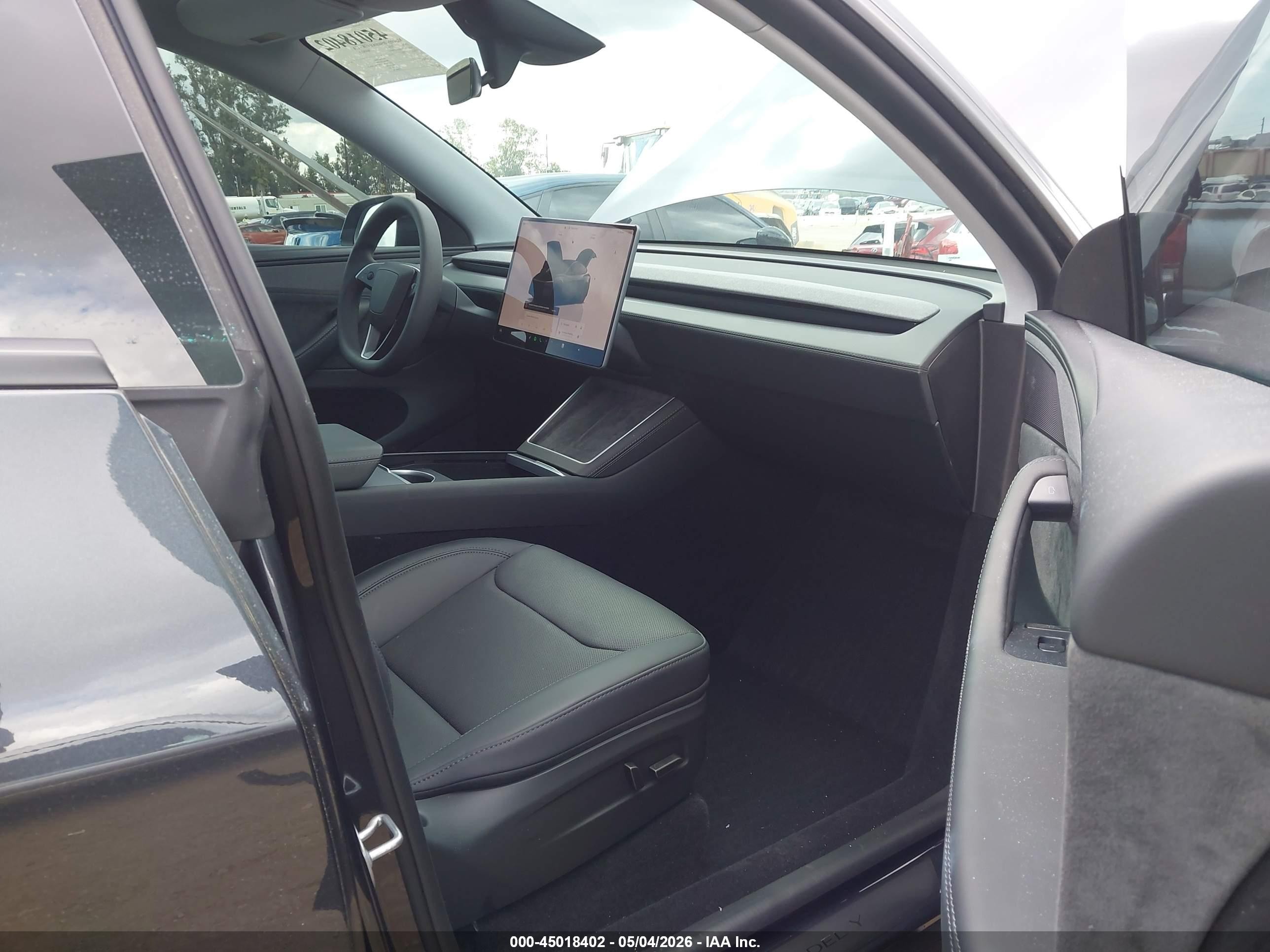 2026 Tesla Model Y Black vin: 7SAYGDED5TF568352