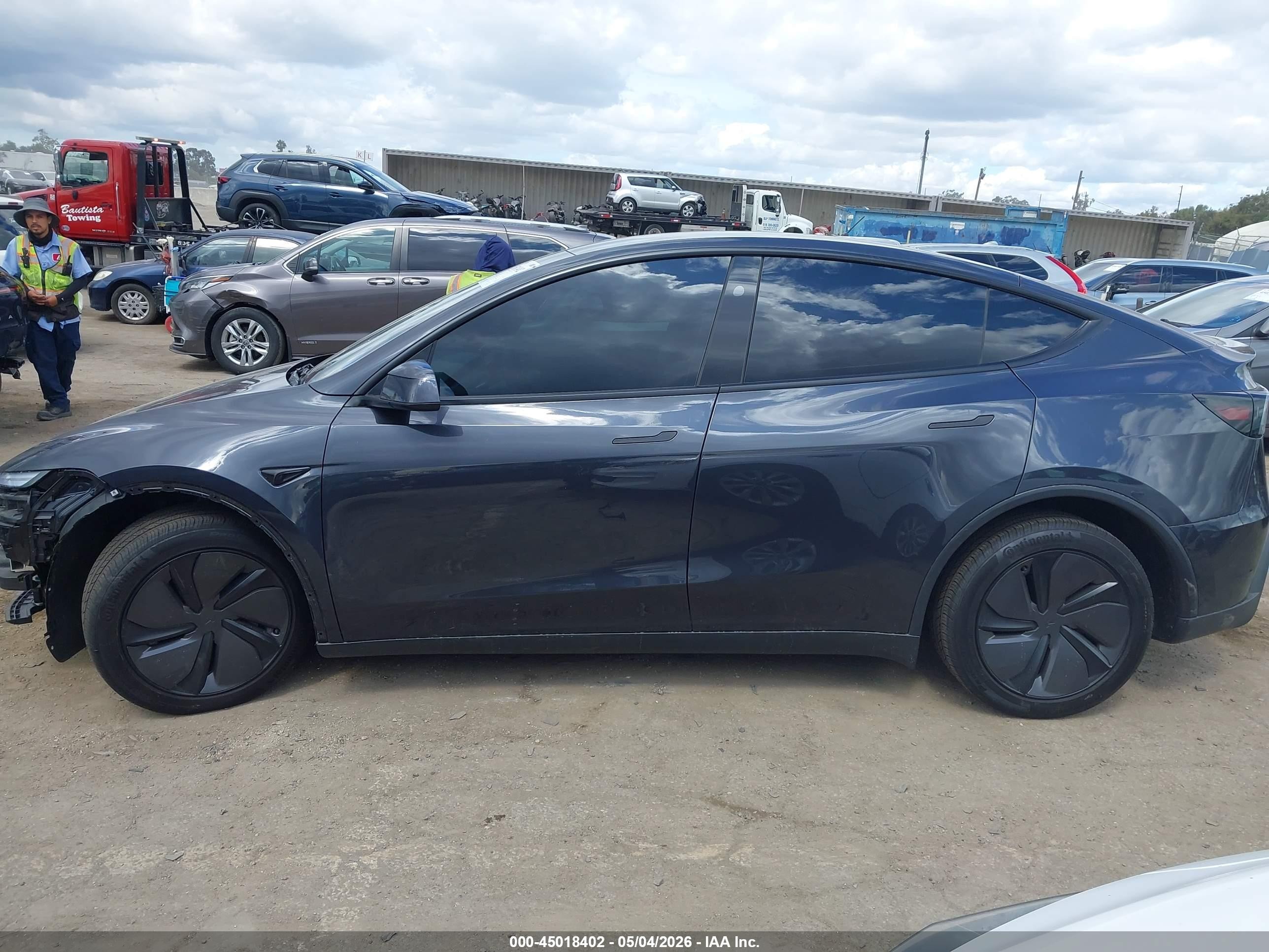 2026 Tesla Model Y Black vin: 7SAYGDED5TF568352