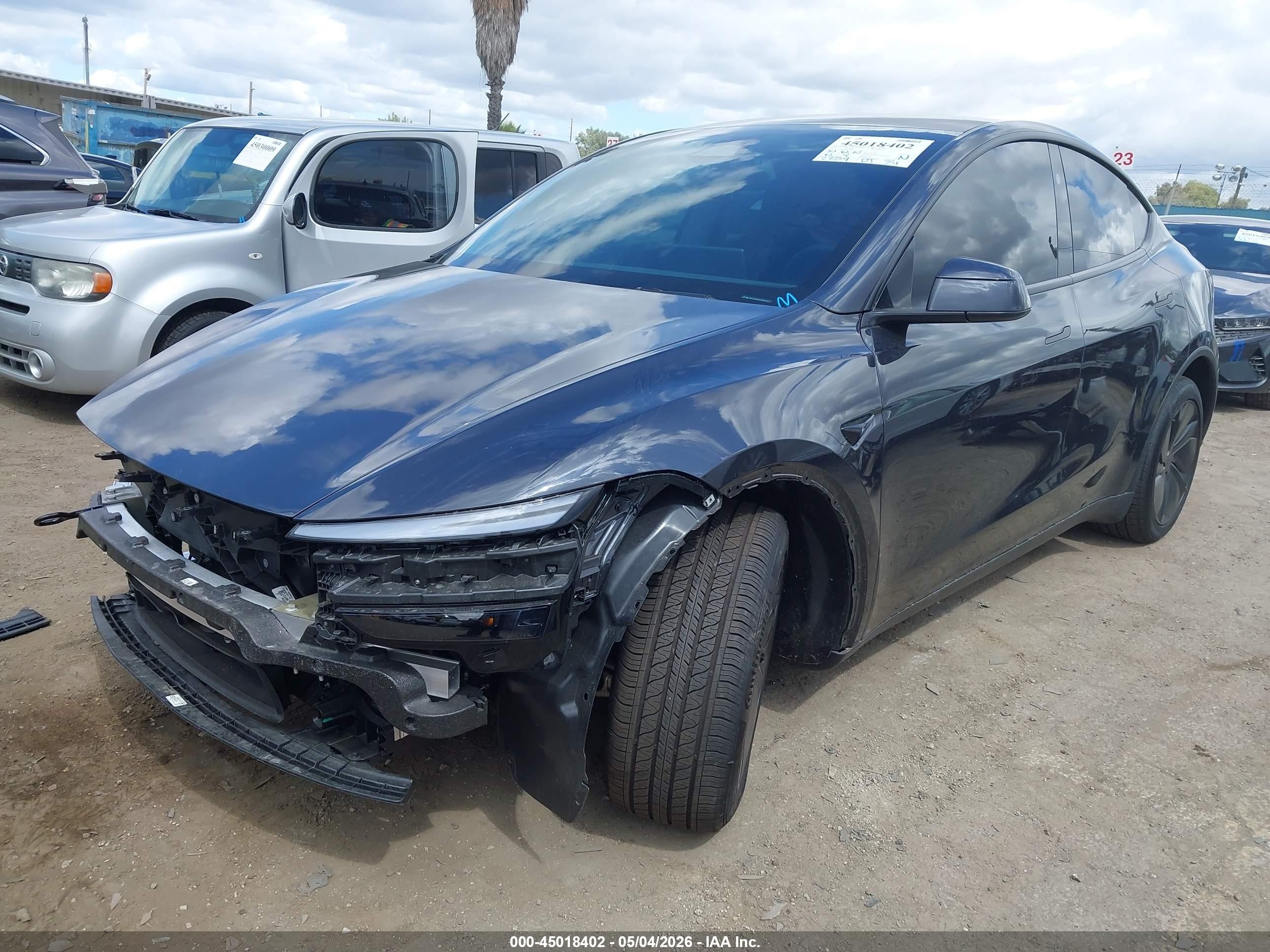 2026 Tesla Model Y Black vin: 7SAYGDED5TF568352