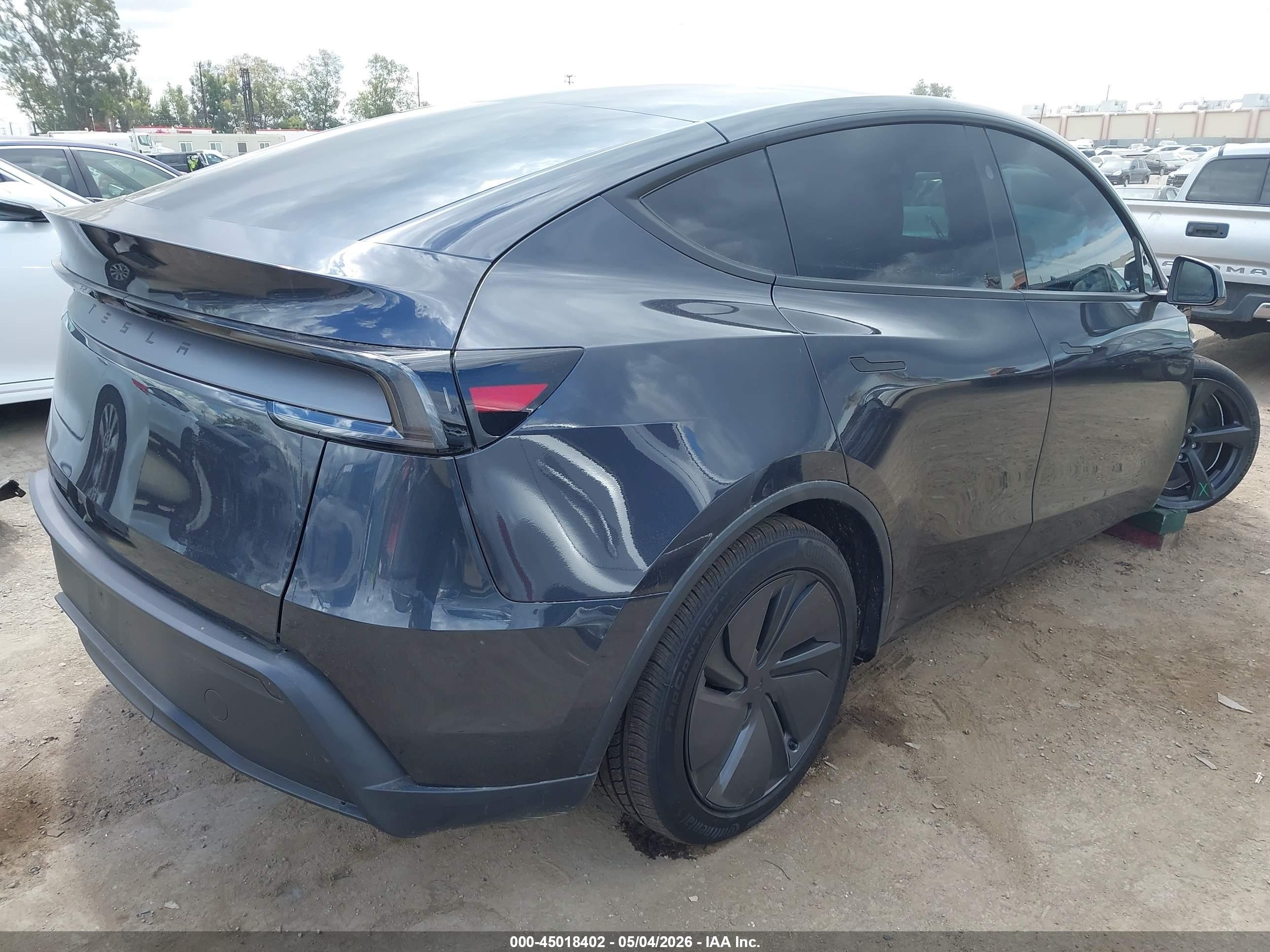 2026 Tesla Model Y Black vin: 7SAYGDED5TF568352