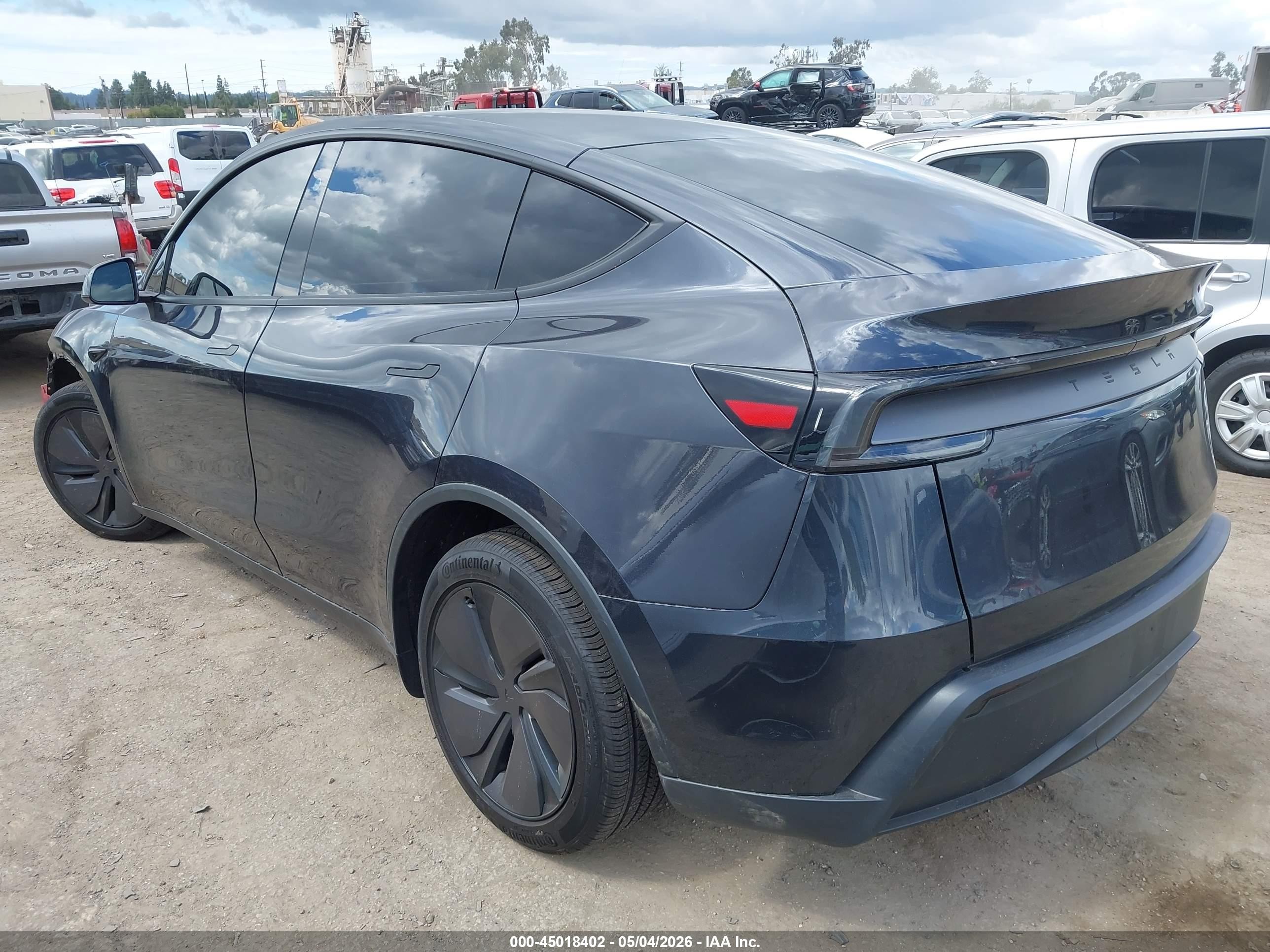 2026 Tesla Model Y Black vin: 7SAYGDED5TF568352