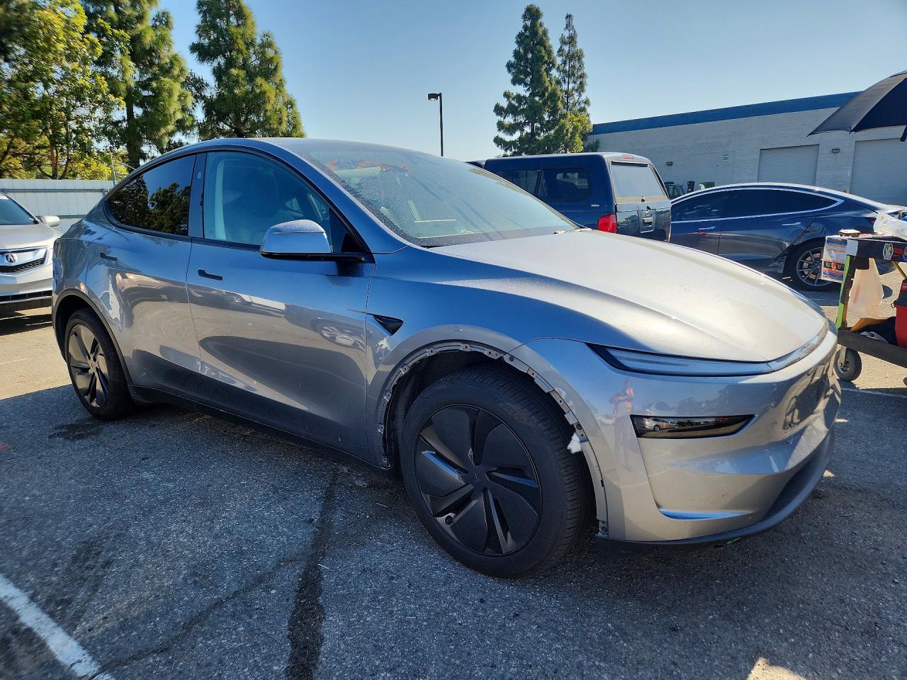 2026 Tesla Model Y Silver vin: 7SAYGDED6TA430588
