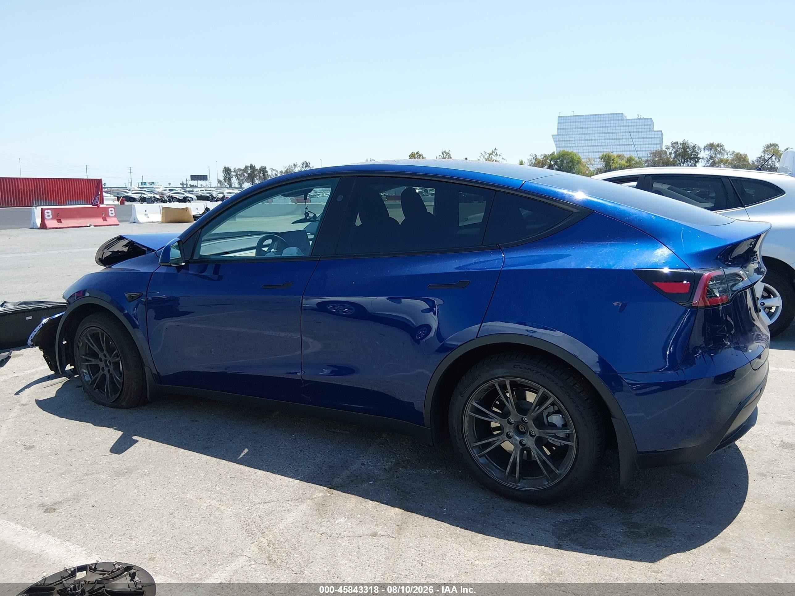 2025 Tesla Model Y Long Range Dual Motor Rear-wheel Drive Blue vin: 7SAYGDED8SF270649