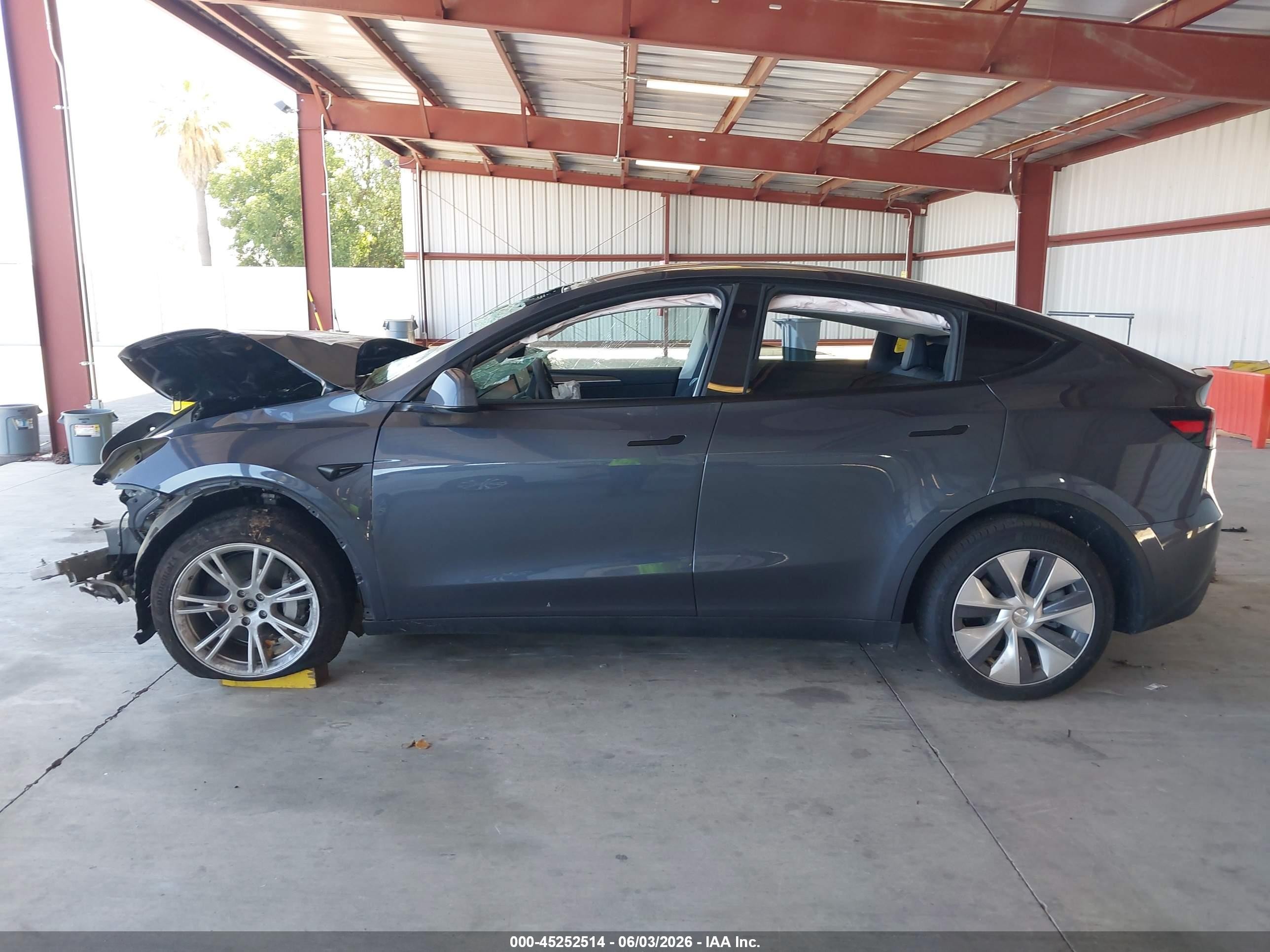 2023 Tesla Model Y Awd/long Range Dual Motor All-wheel Drive Gray vin: 7SAYGDEE0PF904648