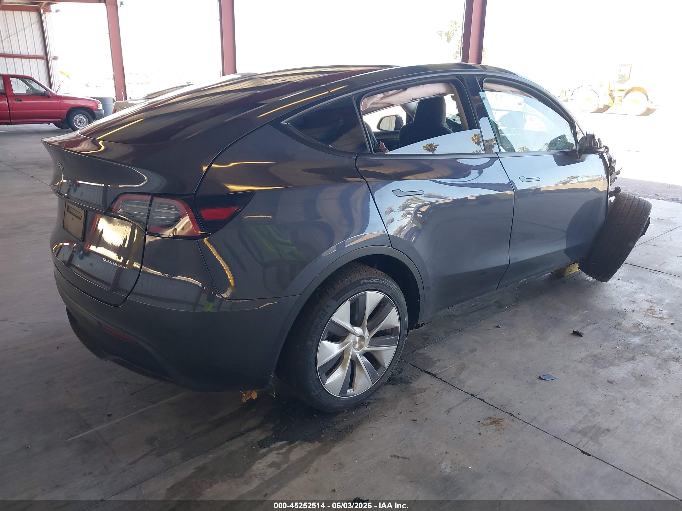2023 Tesla Model Y Awd/long Range Dual Motor All-wheel Drive Gray vin: 7SAYGDEE0PF904648