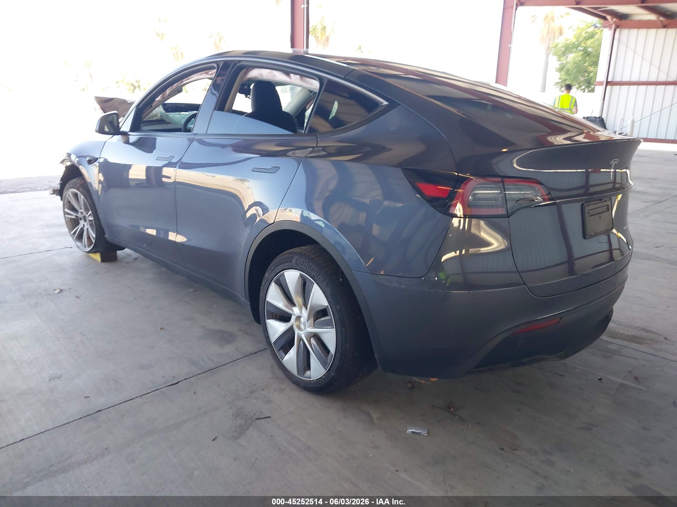 2023 Tesla Model Y Awd/long Range Dual Motor All-wheel Drive Gray vin: 7SAYGDEE0PF904648