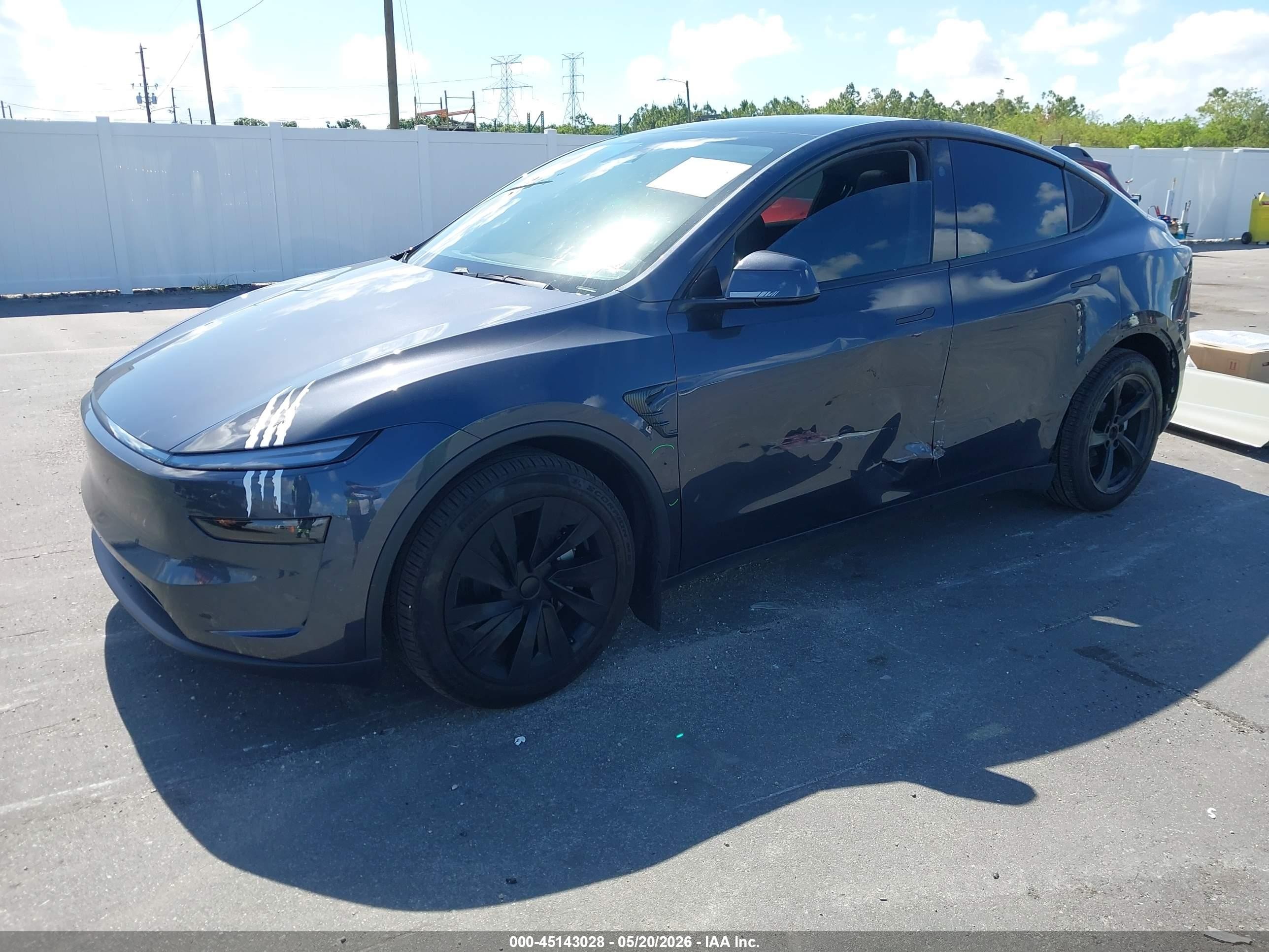 2026 Tesla Model Y All-wheel Drive/long Range Launch Series/premium All-wheel Drive Gray vin: 7SAYGDEE1TA392938