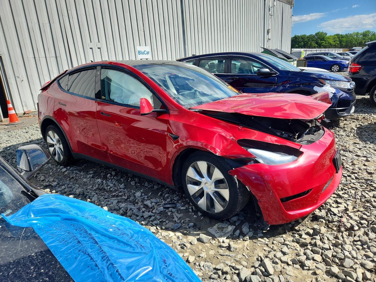 2023 Tesla Model Y Red vin: 7SAYGDEE2PA078883