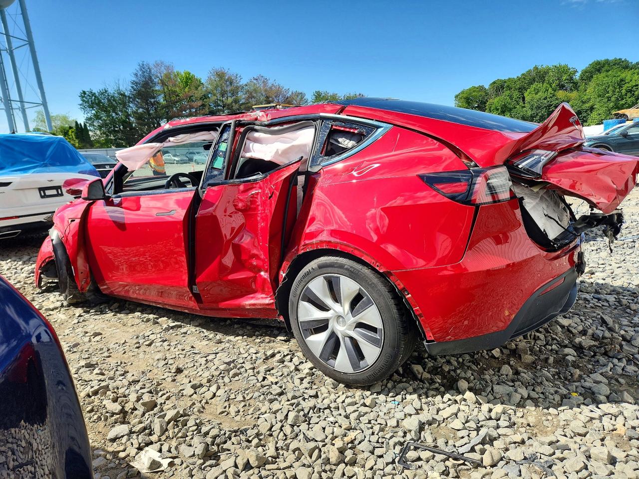 2023 Tesla Model Y Red vin: 7SAYGDEE2PA078883