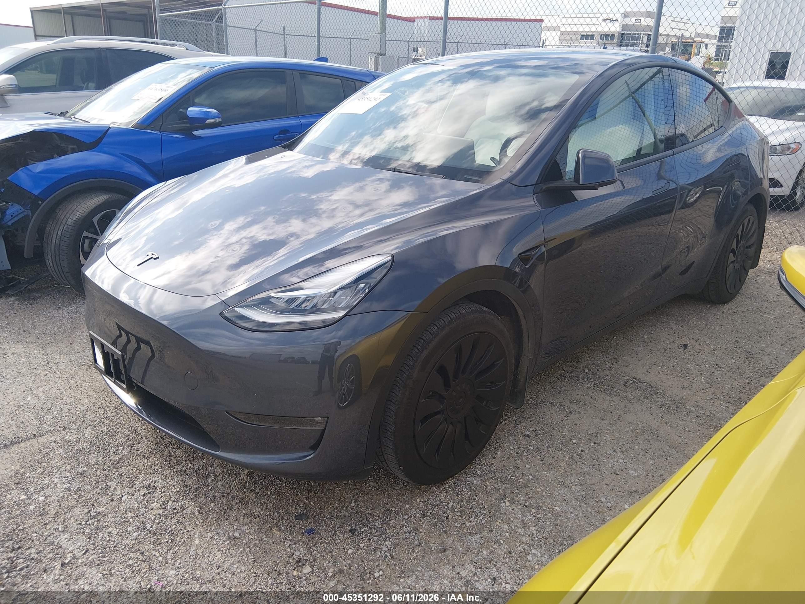 2023 Tesla Model Y Awd/long Range Dual Motor All-wheel Drive Gray vin: 7SAYGDEE2PF617330