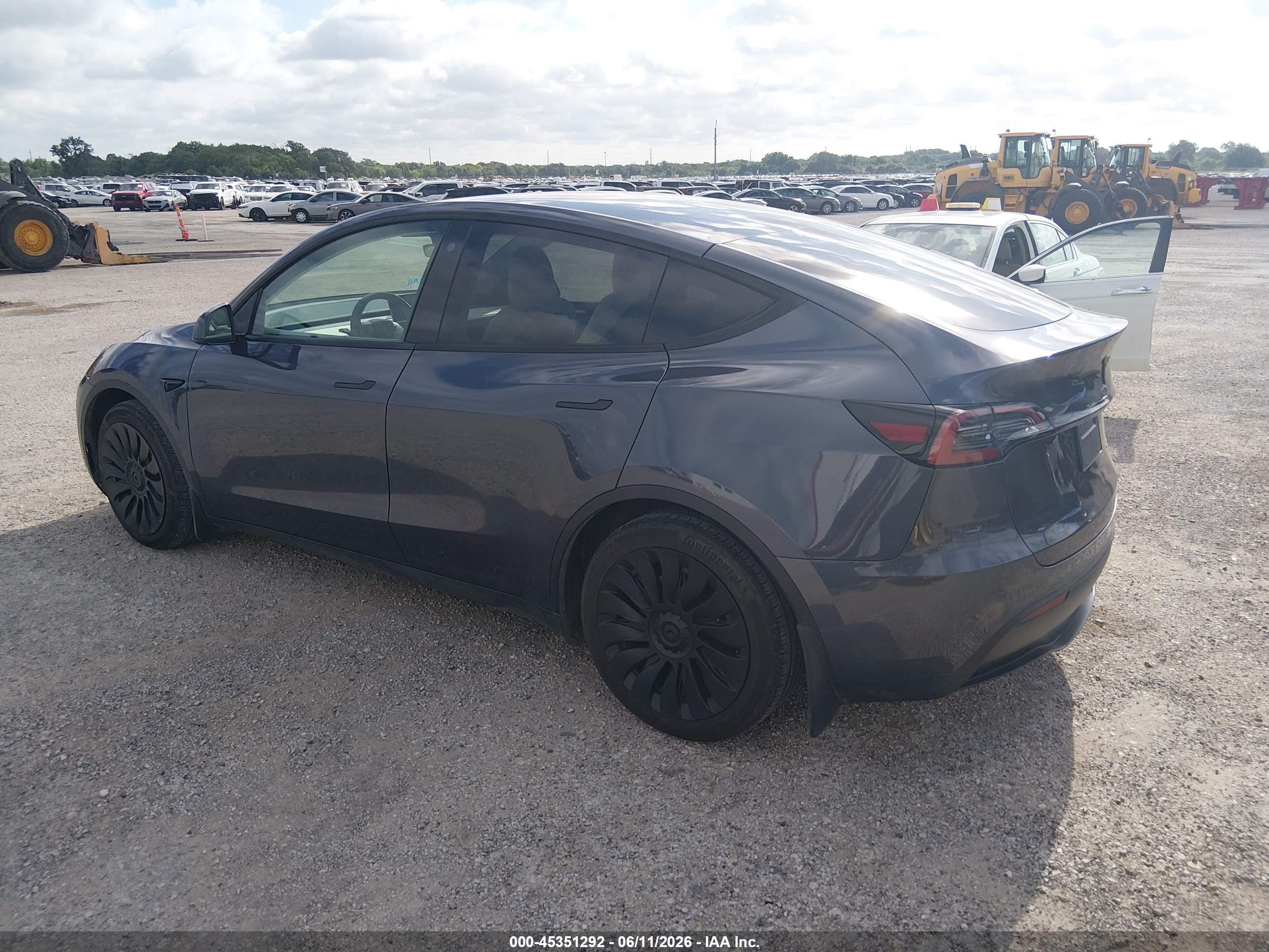2023 Tesla Model Y Awd/long Range Dual Motor All-wheel Drive Gray vin: 7SAYGDEE2PF617330
