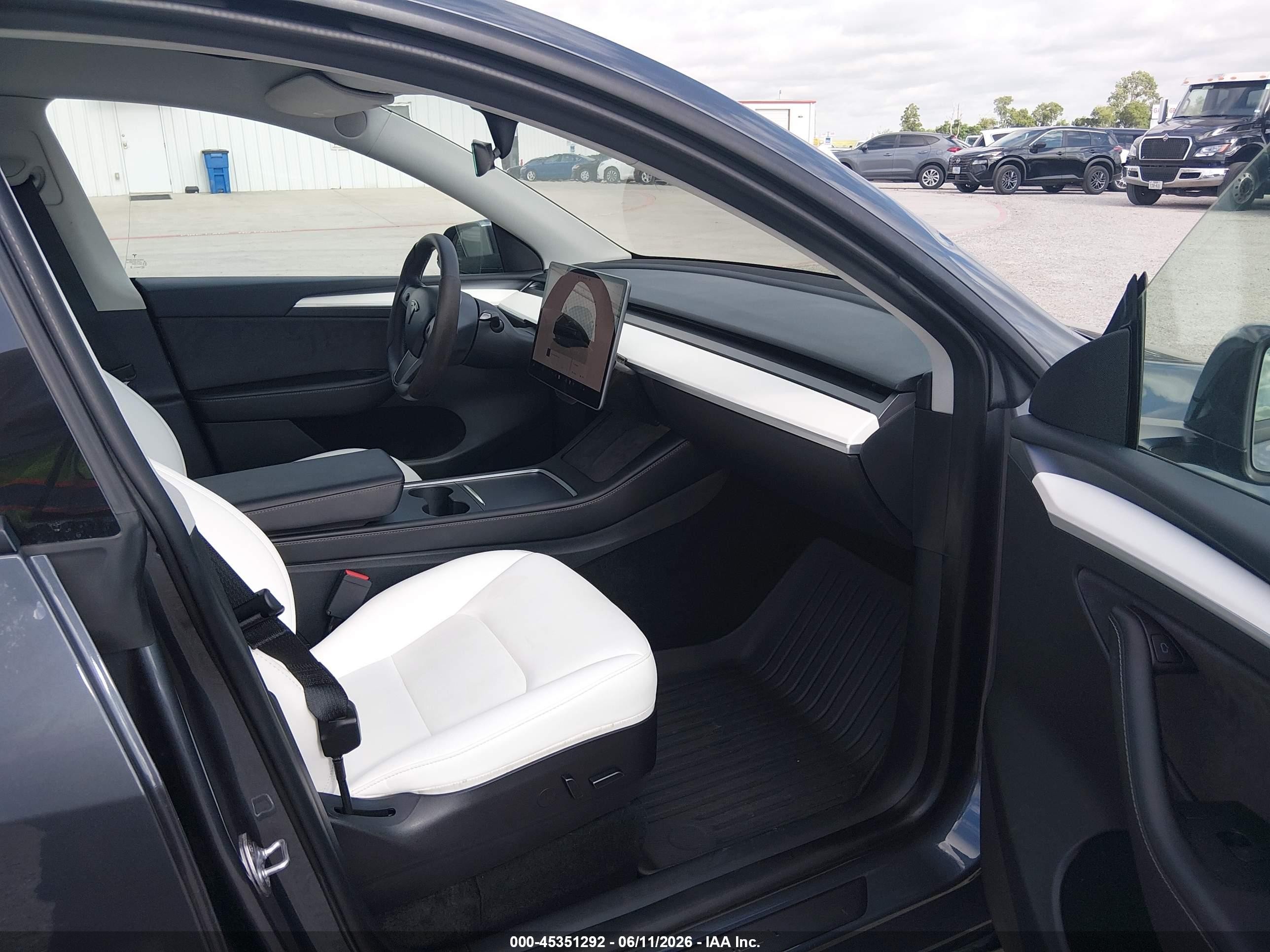 2023 Tesla Model Y Awd/long Range Dual Motor All-wheel Drive Gray vin: 7SAYGDEE2PF617330