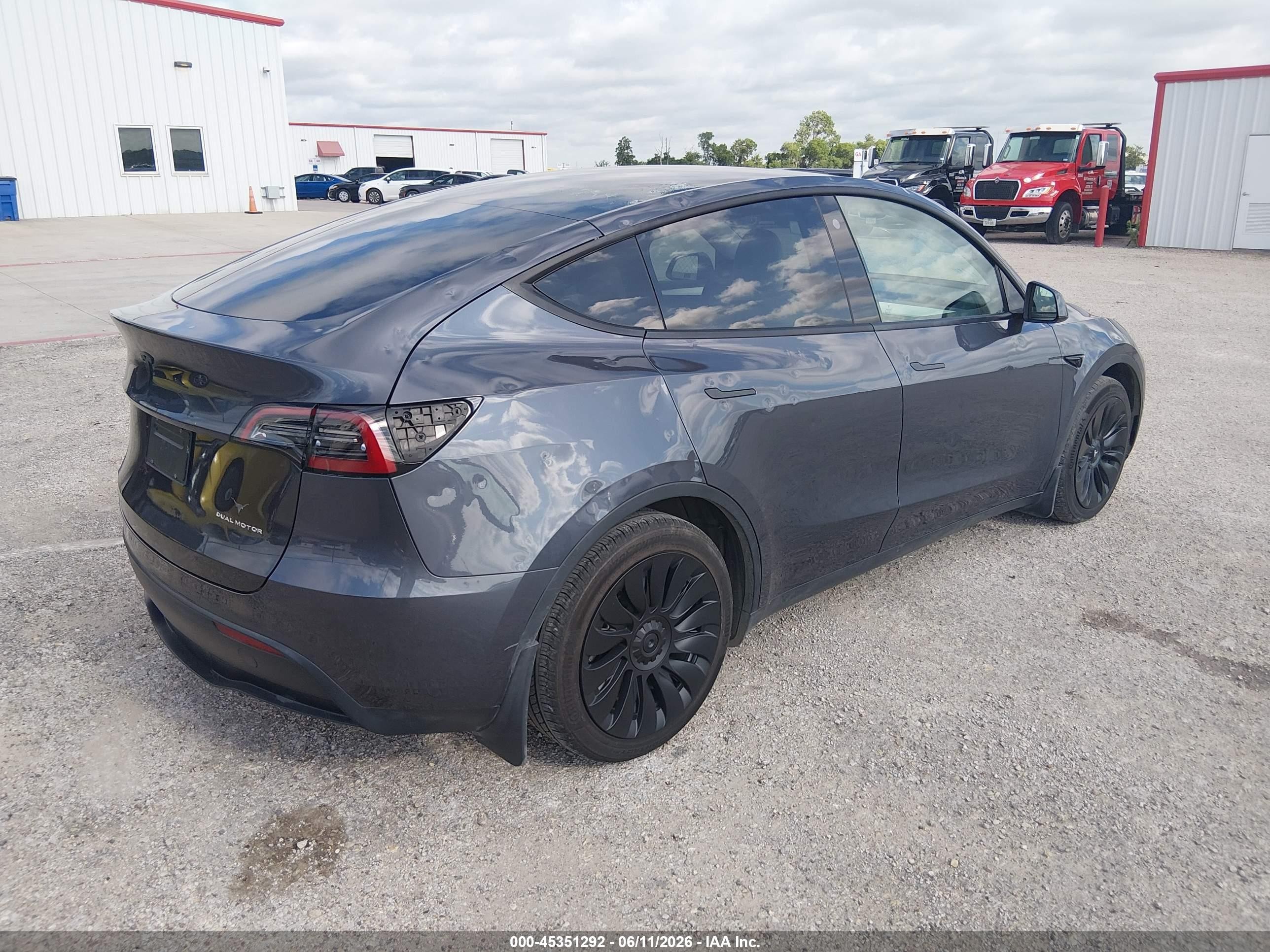 2023 Tesla Model Y Awd/long Range Dual Motor All-wheel Drive Gray vin: 7SAYGDEE2PF617330