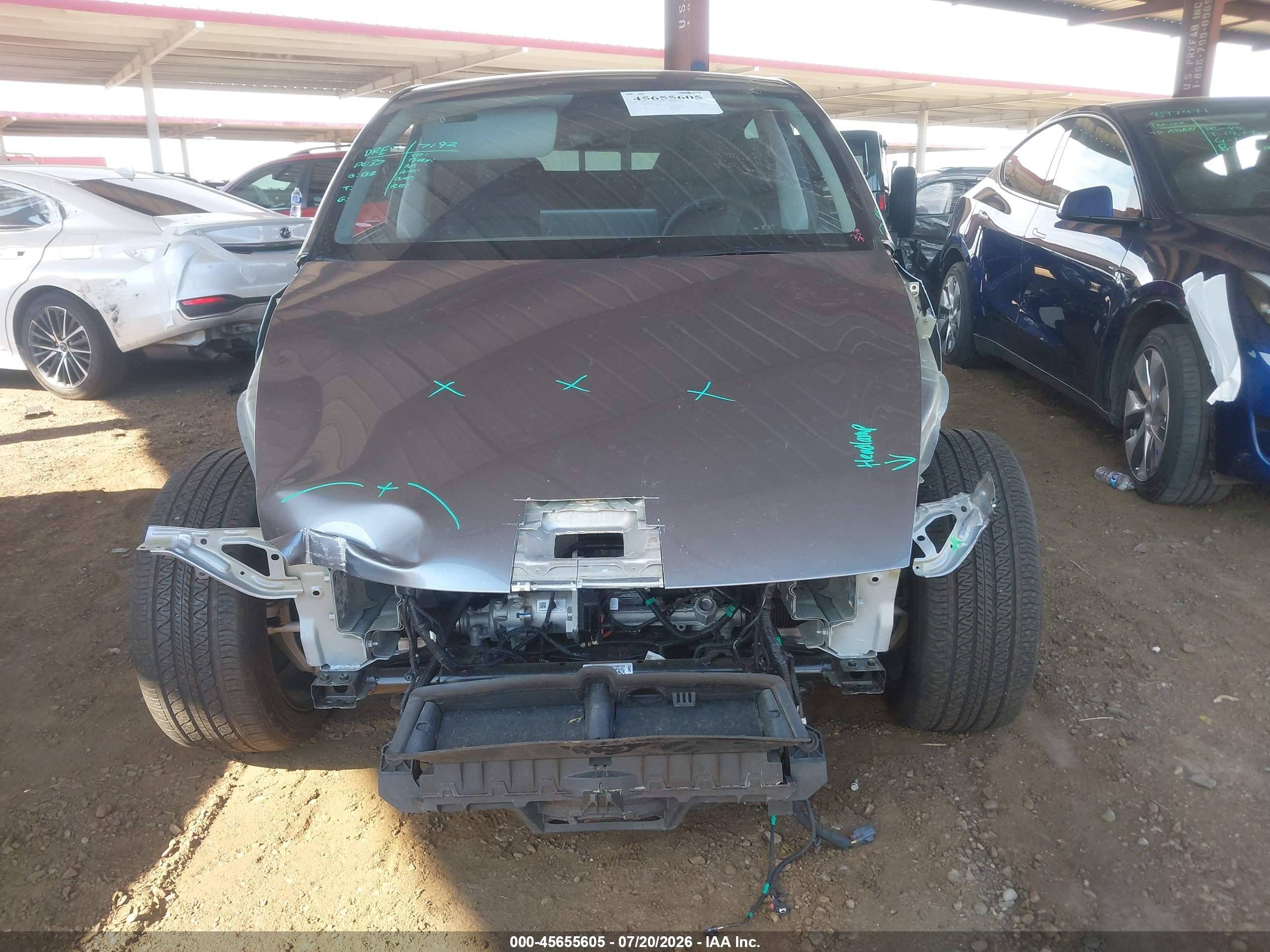 2026 Tesla Model Y All-wheel Drive/long Range Launch Series/premium All-wheel Drive Silver vin: 7SAYGDEE2TF404856