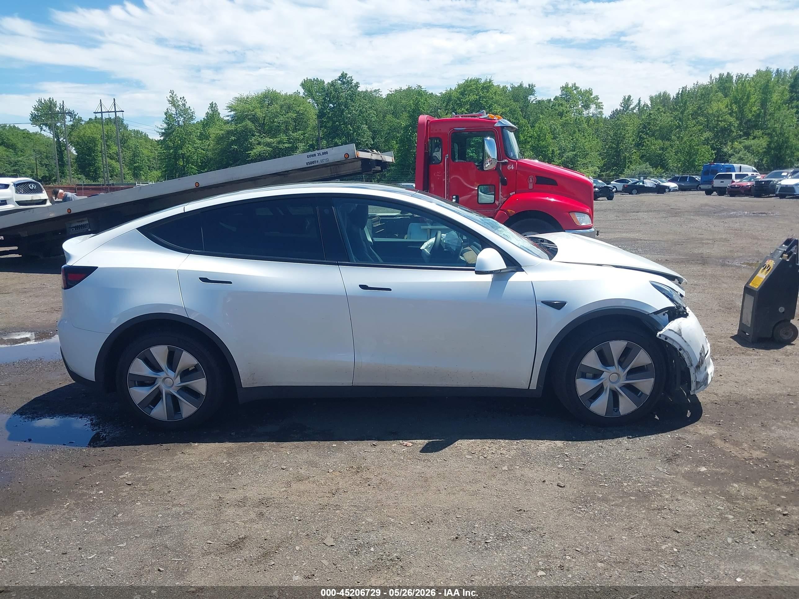 2023 Tesla Model Y Awd/long Range Dual Motor All-wheel Drive White vin: 7SAYGDEE5PA055730