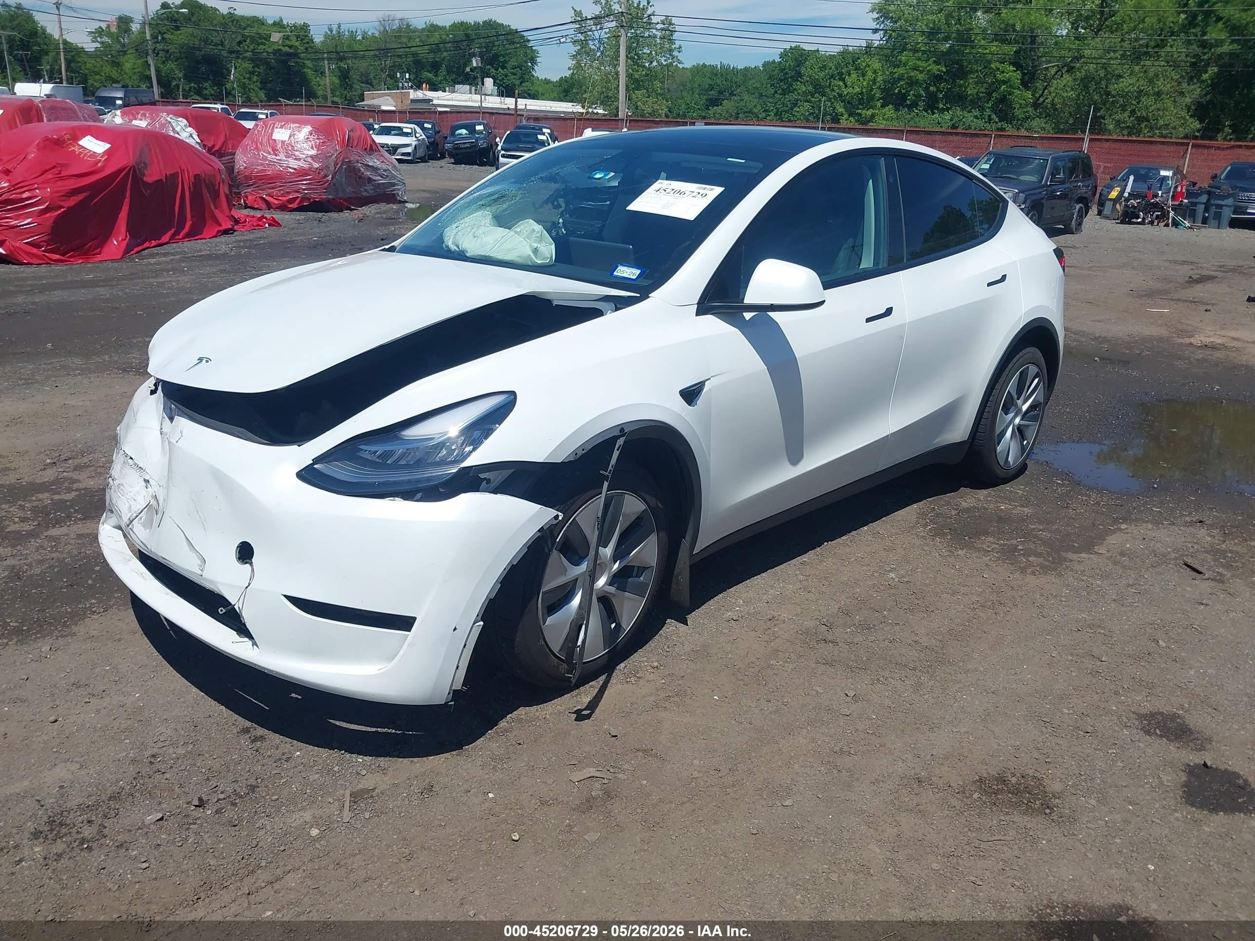 2023 Tesla Model Y Awd/long Range Dual Motor All-wheel Drive White vin: 7SAYGDEE5PA055730