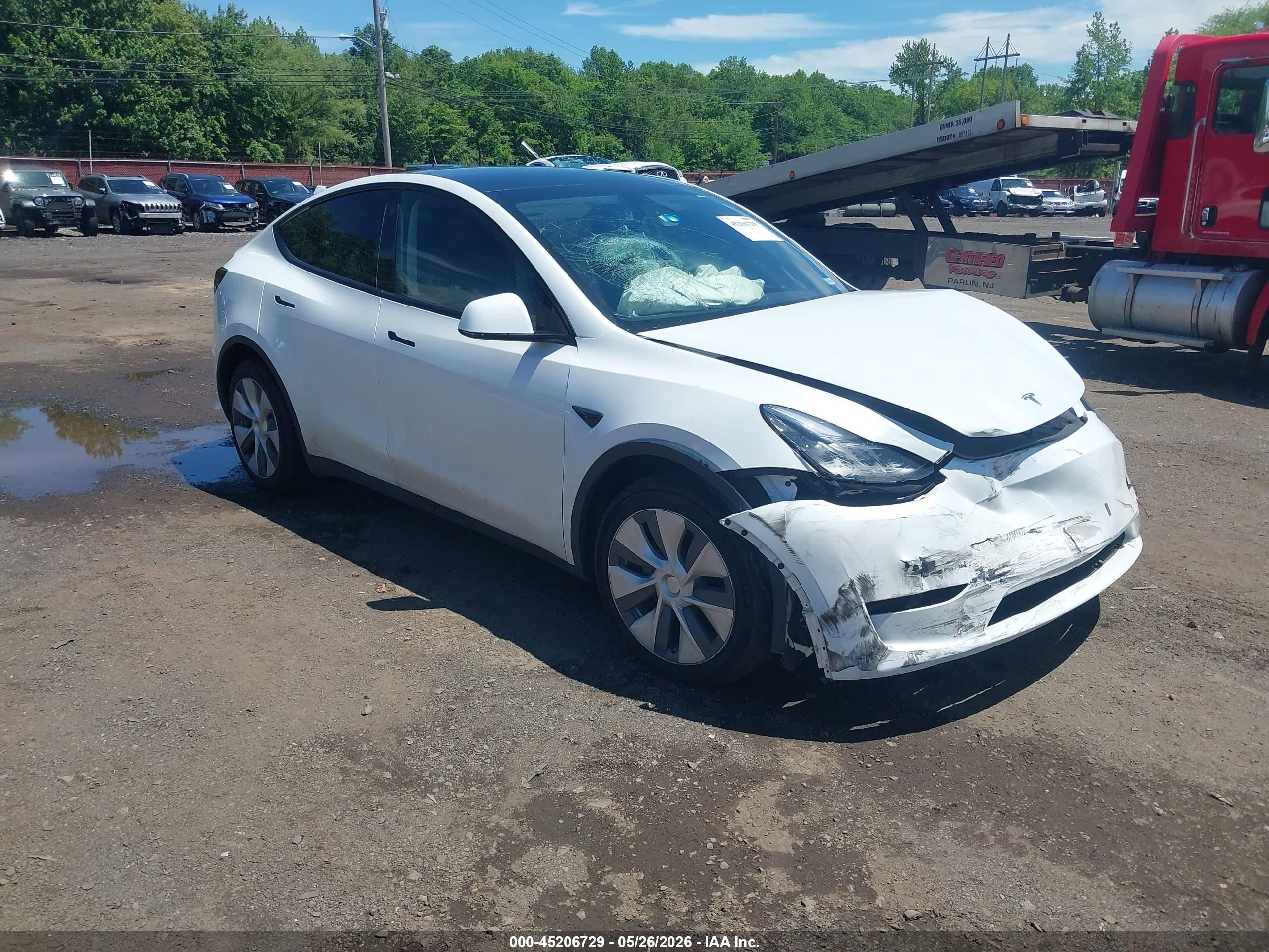 2023 Tesla Model Y Awd/long Range Dual Motor All-wheel Drive White vin: 7SAYGDEE5PA055730
