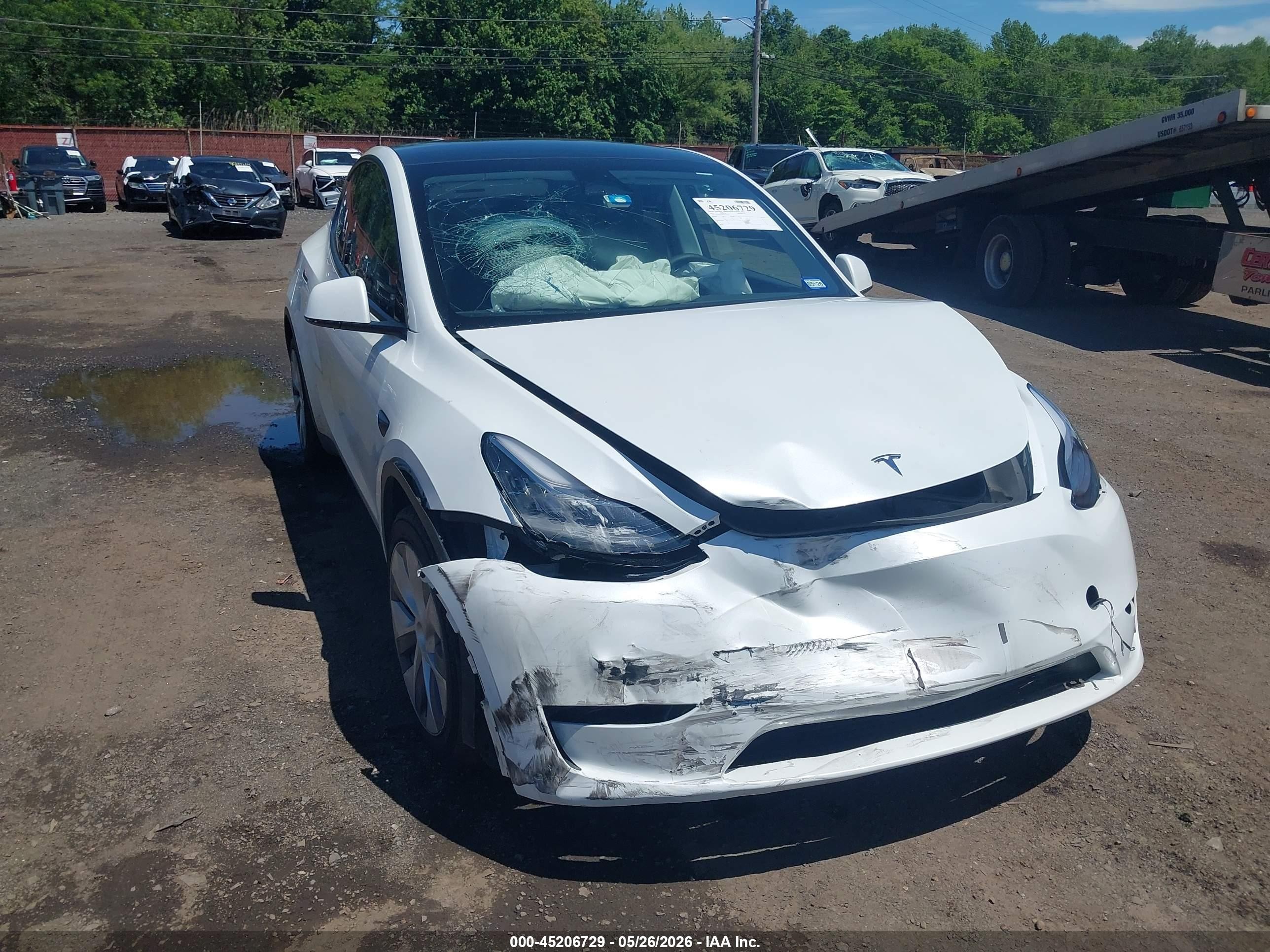 2023 Tesla Model Y Awd/long Range Dual Motor All-wheel Drive White vin: 7SAYGDEE5PA055730