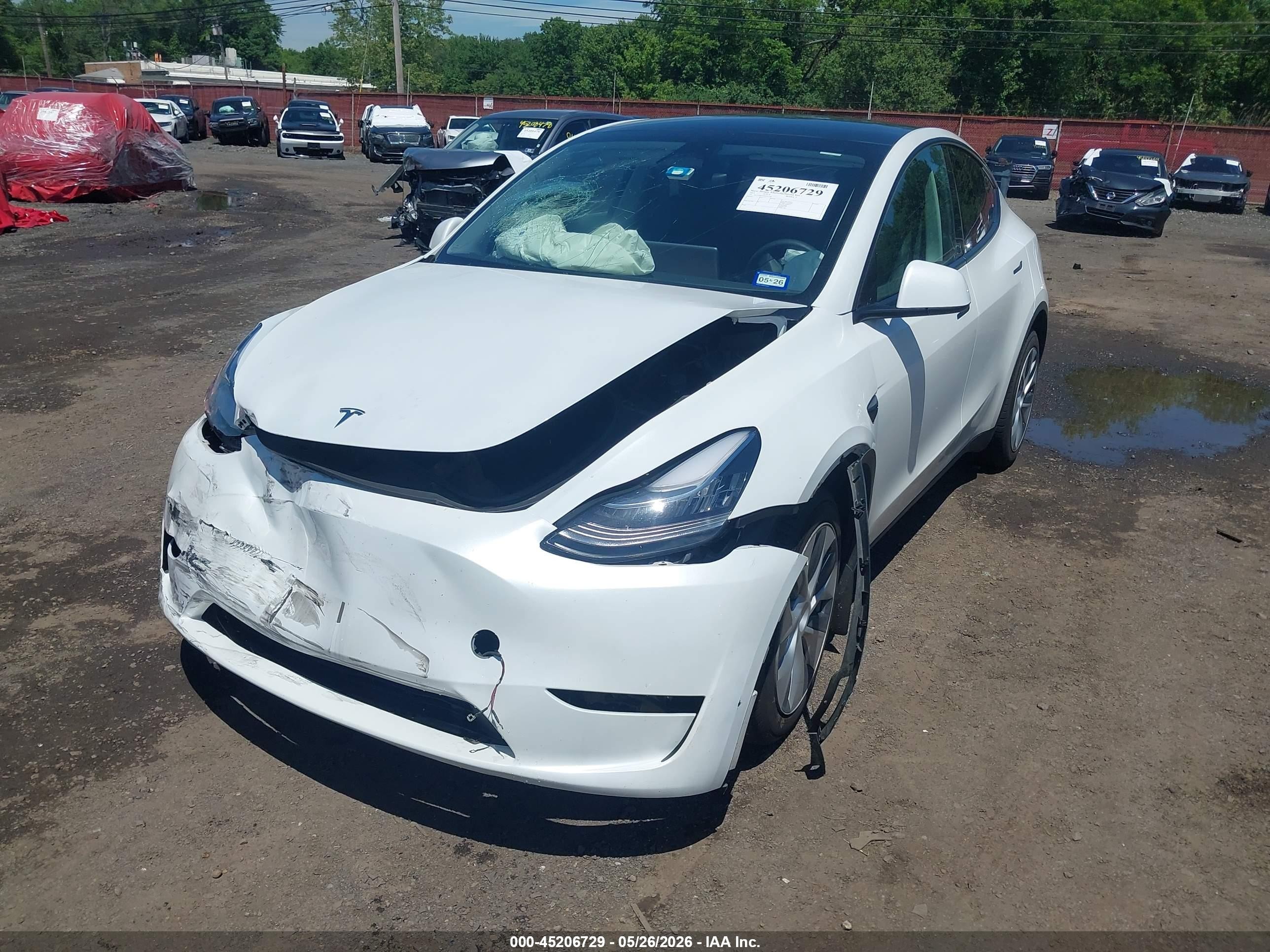2023 Tesla Model Y Awd/long Range Dual Motor All-wheel Drive White vin: 7SAYGDEE5PA055730