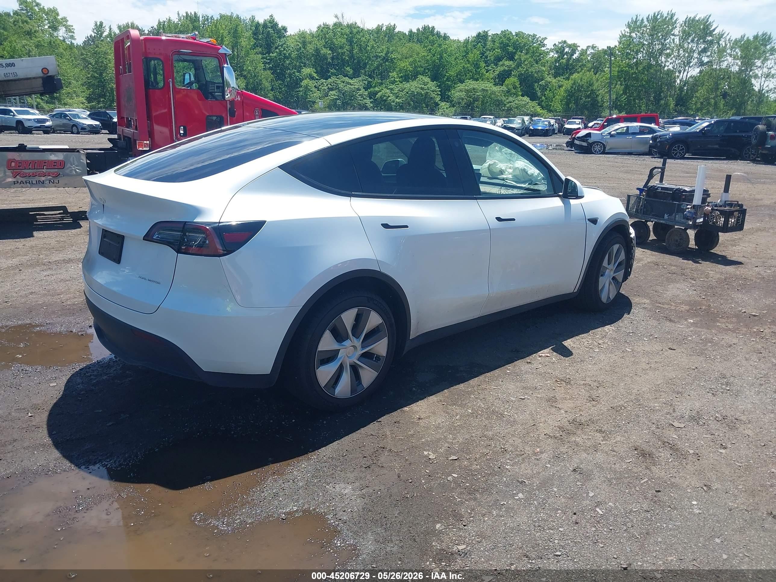 2023 Tesla Model Y Awd/long Range Dual Motor All-wheel Drive White vin: 7SAYGDEE5PA055730
