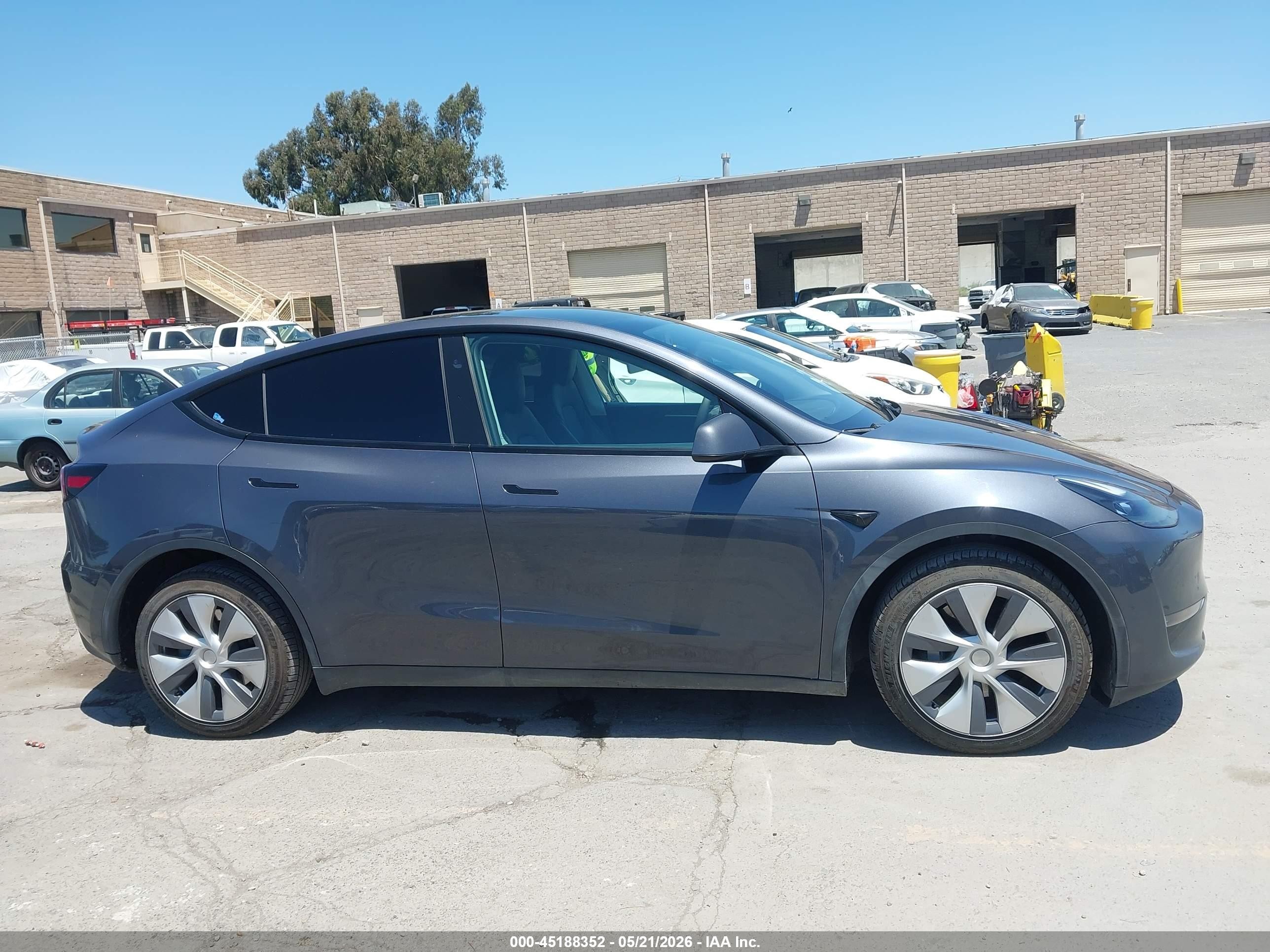 2023 Tesla Model Y Awd/long Range Dual Motor All-wheel Drive Gray vin: 7SAYGDEE6PF926881