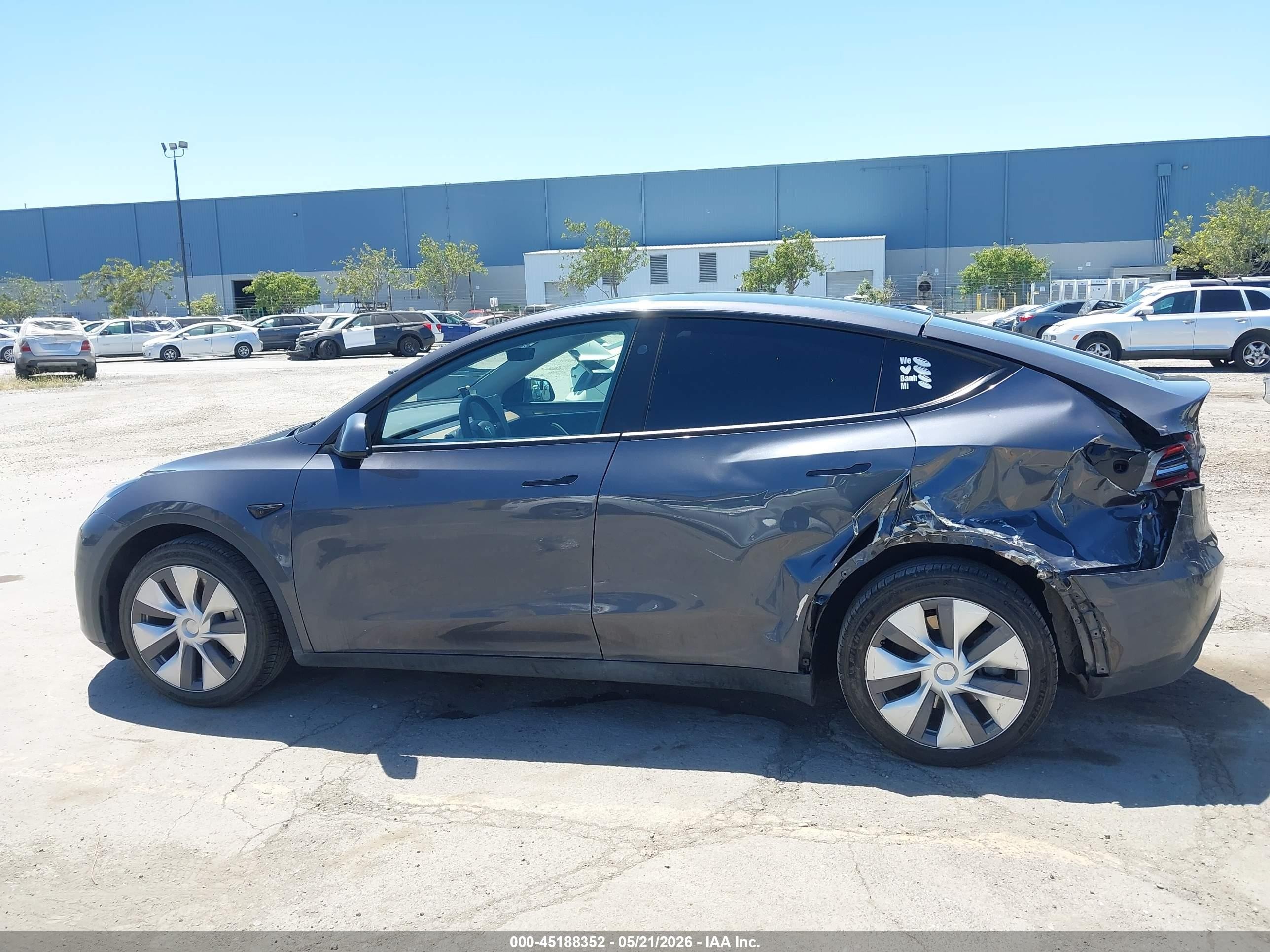 2023 Tesla Model Y Awd/long Range Dual Motor All-wheel Drive Gray vin: 7SAYGDEE6PF926881