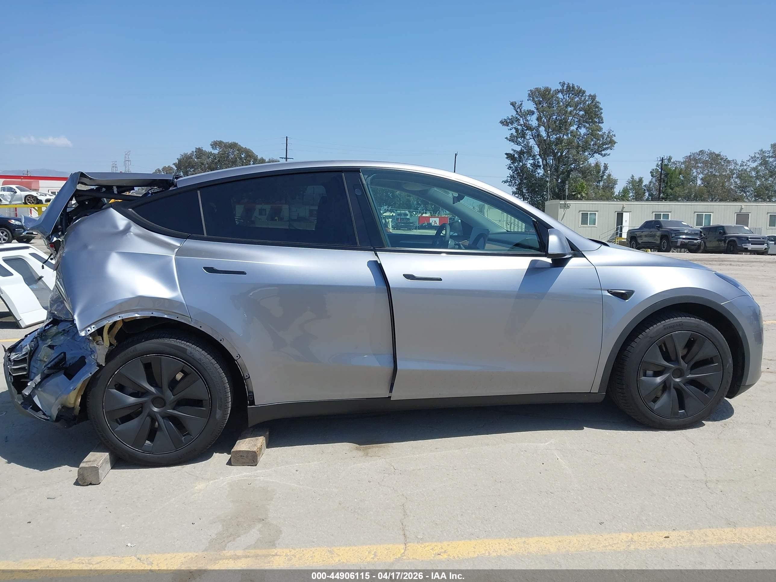 2024 Tesla Model Y Long Range Dual Motor All-wheel Drive Silver vin: 7SAYGDEE6RA295601