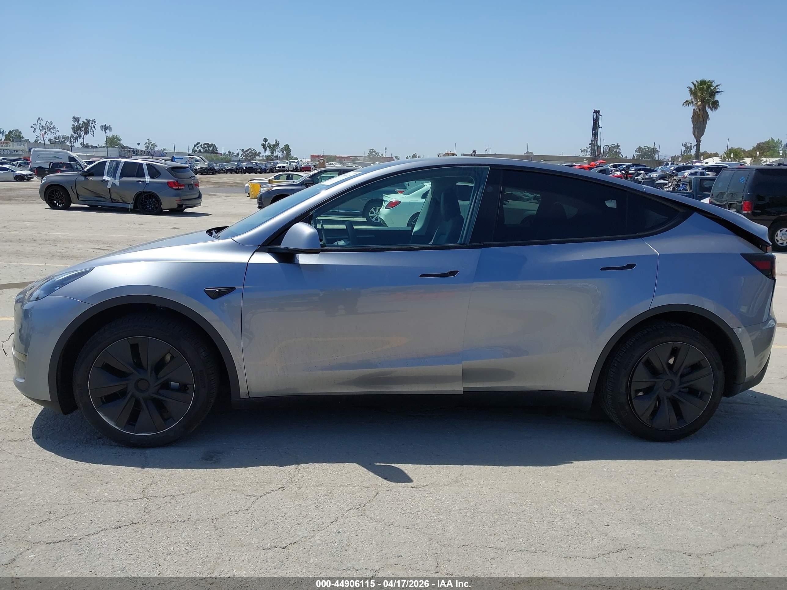 2024 Tesla Model Y Long Range Dual Motor All-wheel Drive Silver vin: 7SAYGDEE6RA295601
