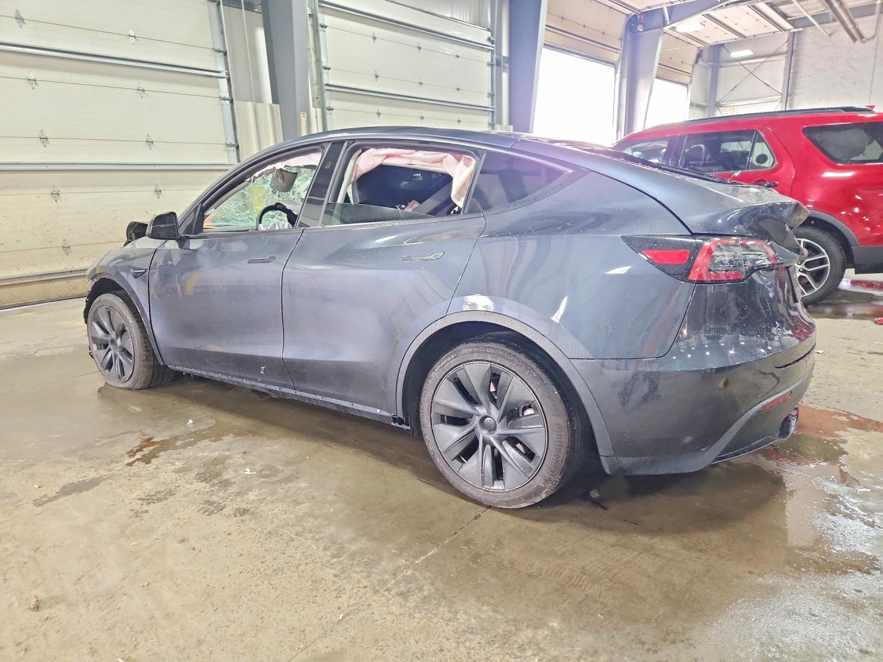 2024 Tesla Model Y Blue vin: 7SAYGDEE6RF155776